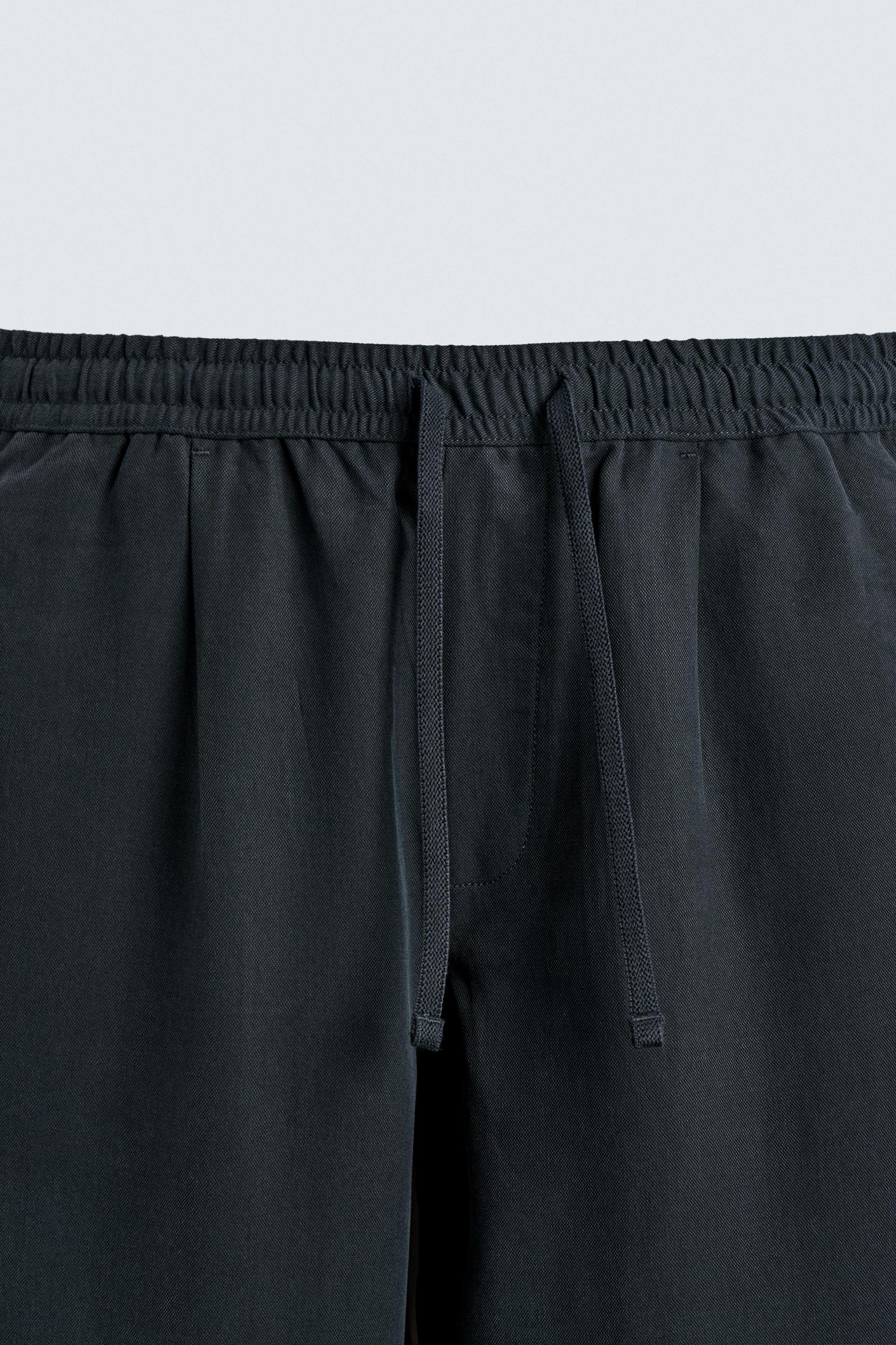 100% LYOCELL REGULAR FIT PANTS Product Image