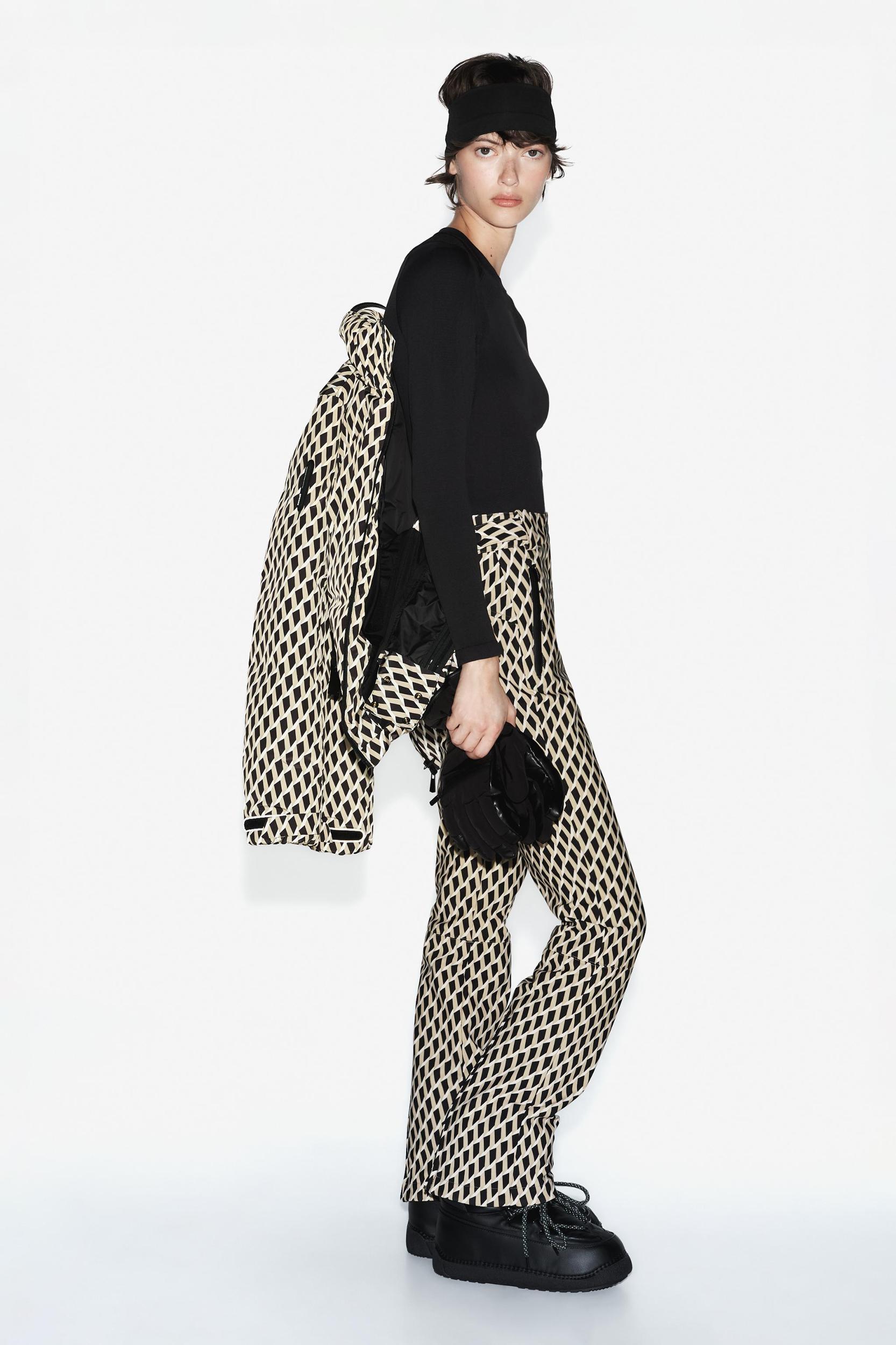 RECCO® TECHNOLOGY WATER RESISTANT AND WIND PROTECTION FLARED PANTS SKI COLLECTION Product Image