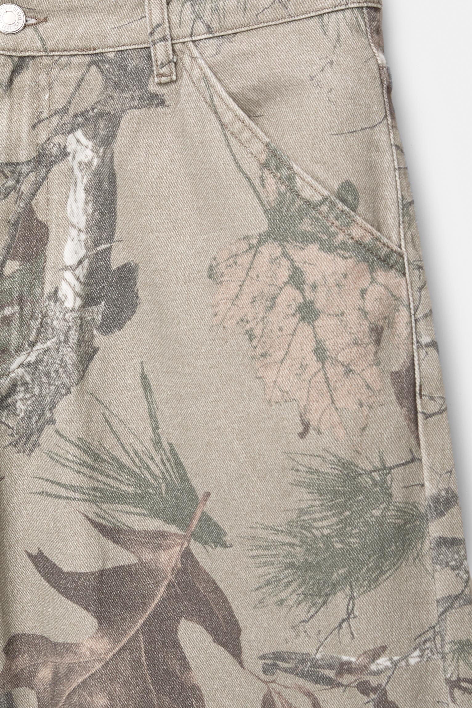 Baggy Bermuda shorts with branch print Product Image