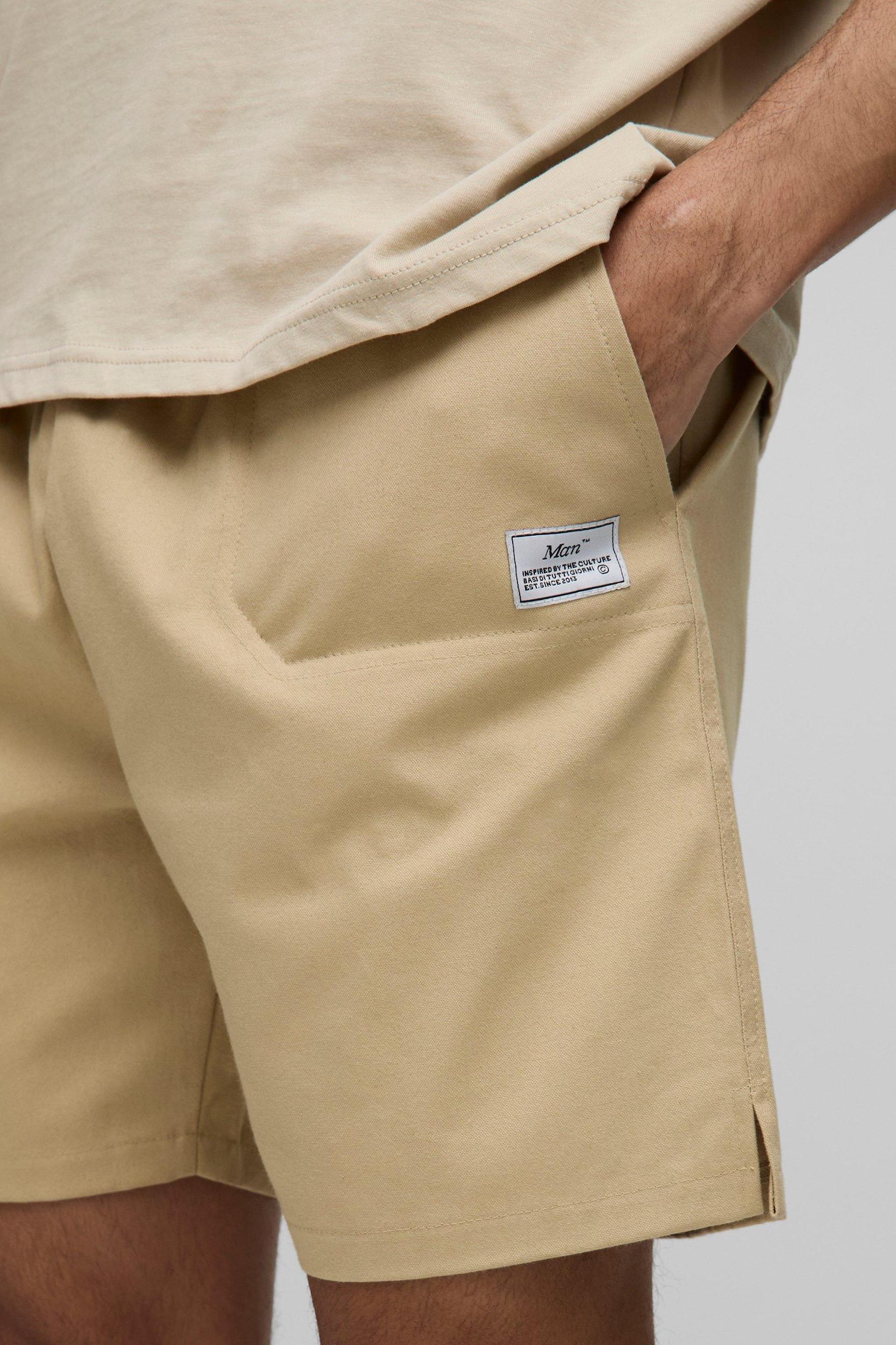 Elasticated Waist Relaxed Woven Tab Canvas Shorts | boohooMAN USA Product Image