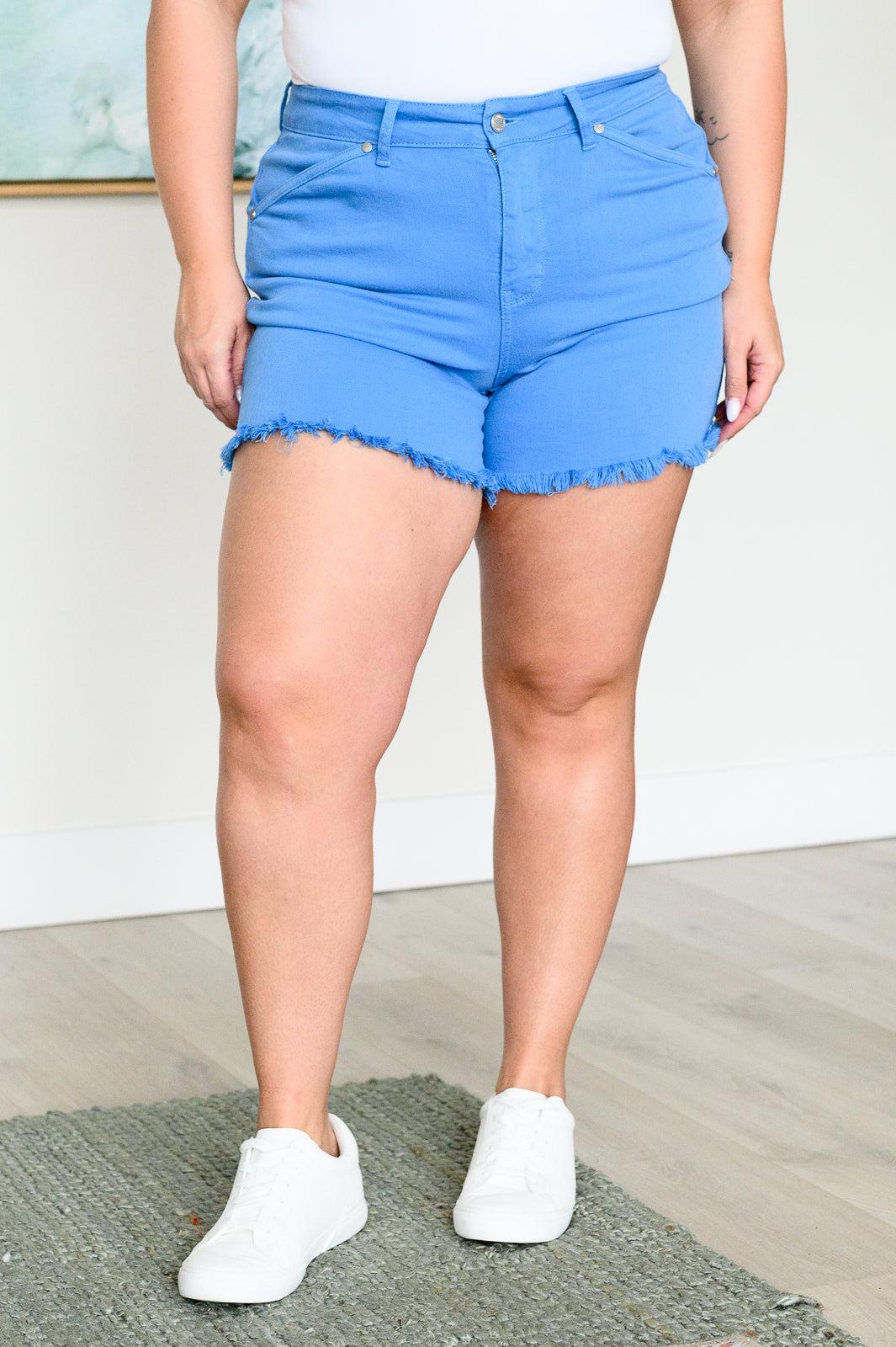 Celeste Mid Rise Shield Pocket Cutoff Shorts in Sky Blue (Online Exclusive) Product Image