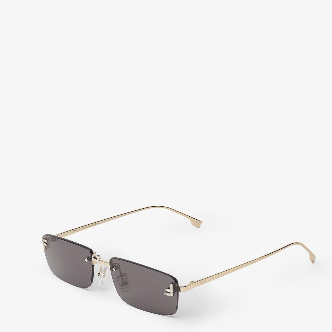 Fendi First CrystalGold-colored sunglasses with gray lenses Product Image