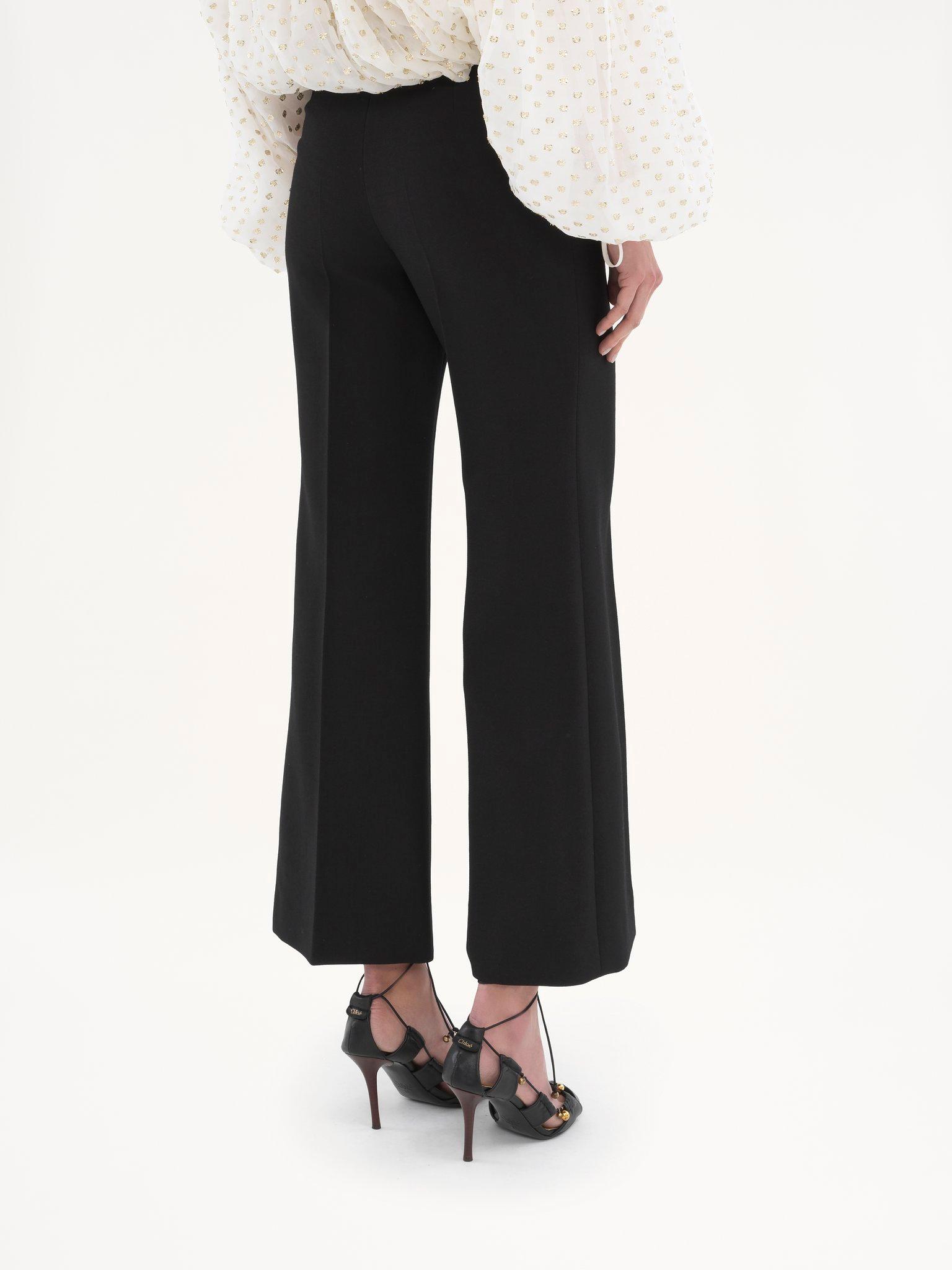 Cropped bootcut pants in wool crêpe Product Image