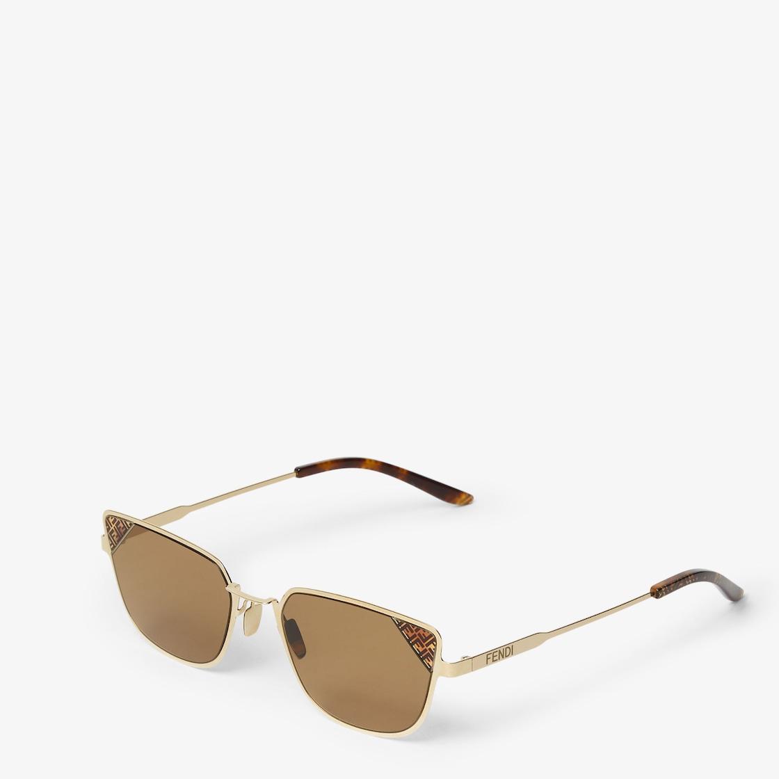 Fendi SignatureGold metal sunglasses with tobacco-color lenses Product Image