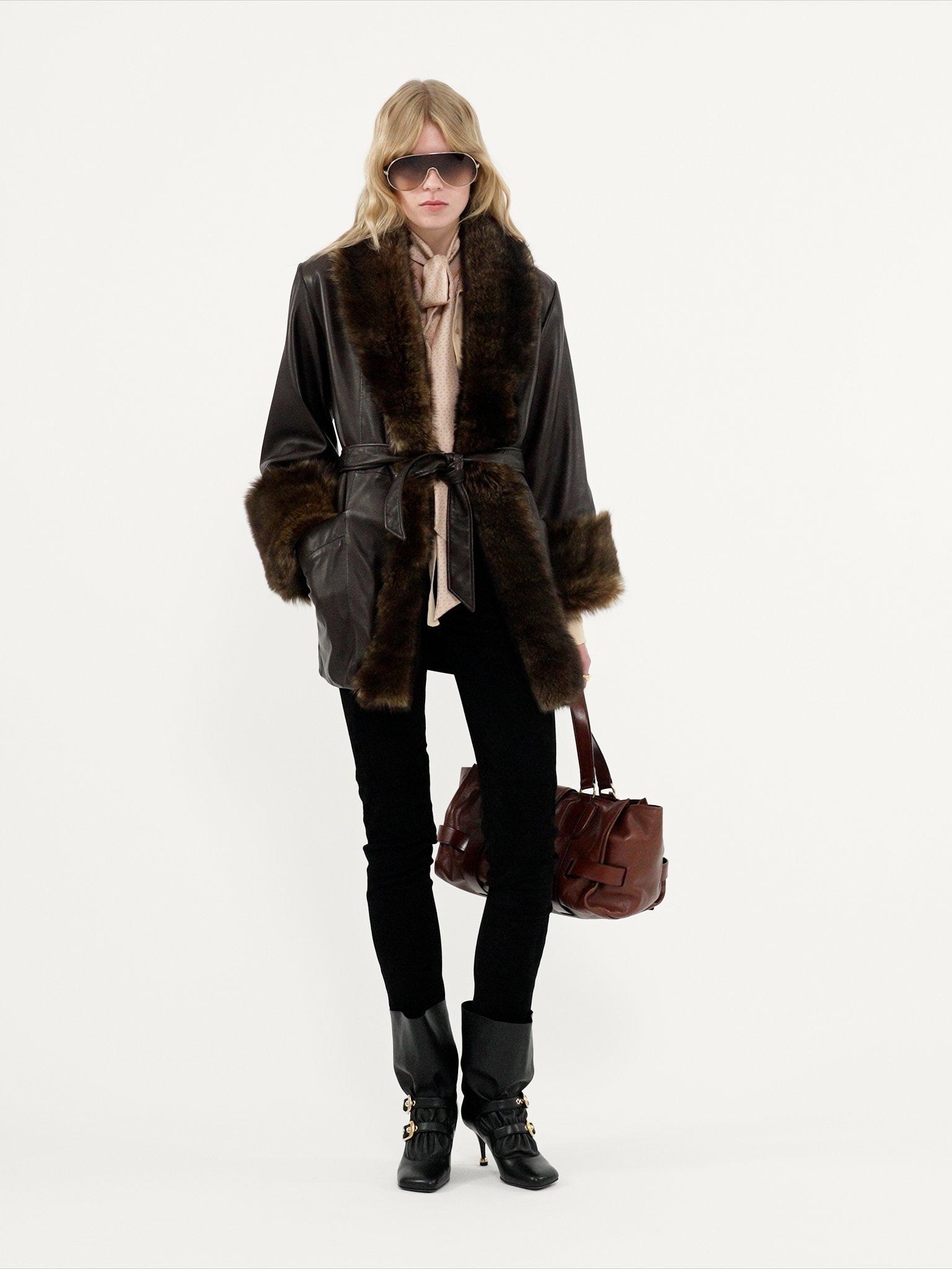 Belted oversized coat in leather Product Image