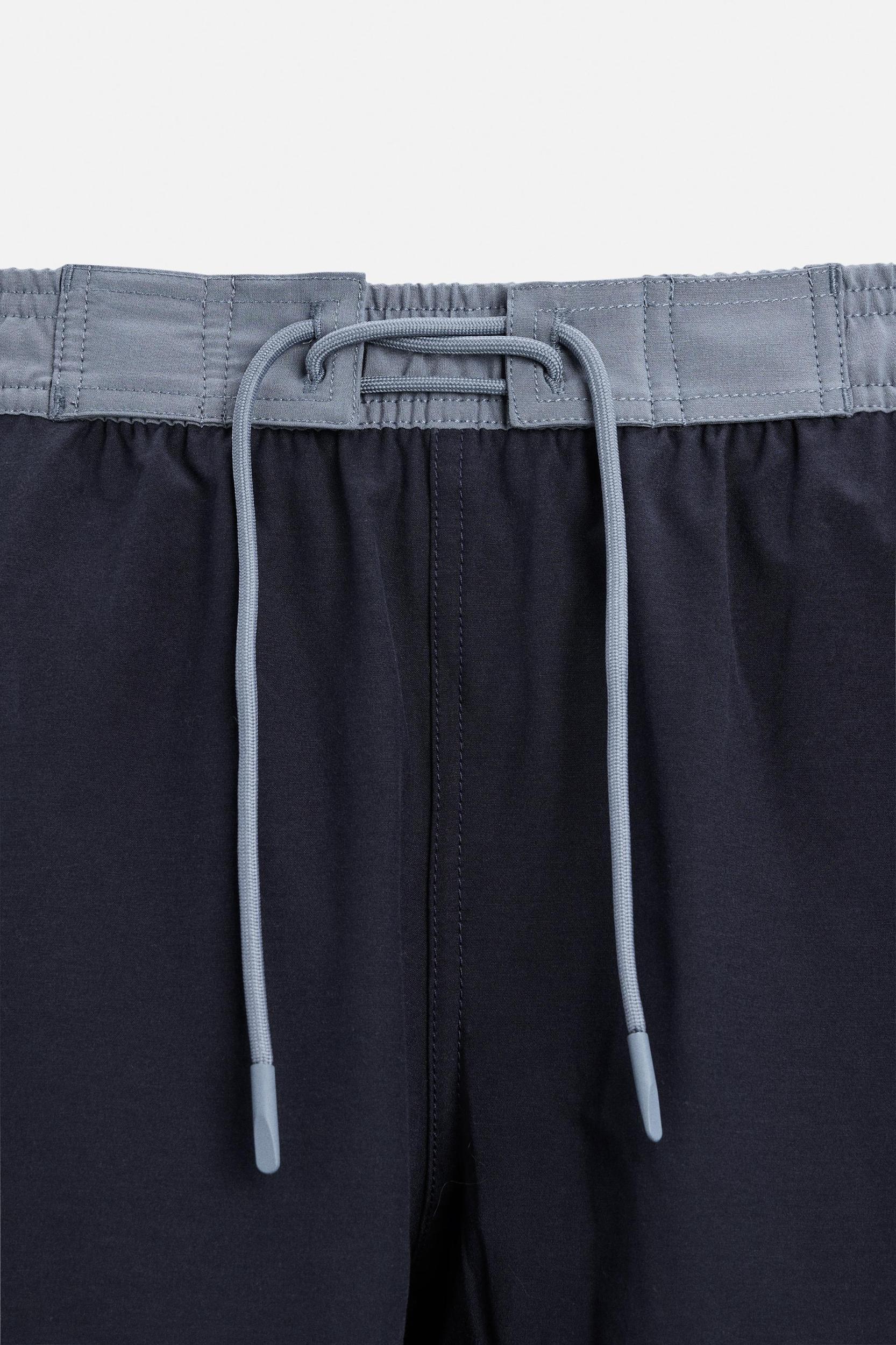 CONTRAST REGULAR SWIMSUIT Product Image