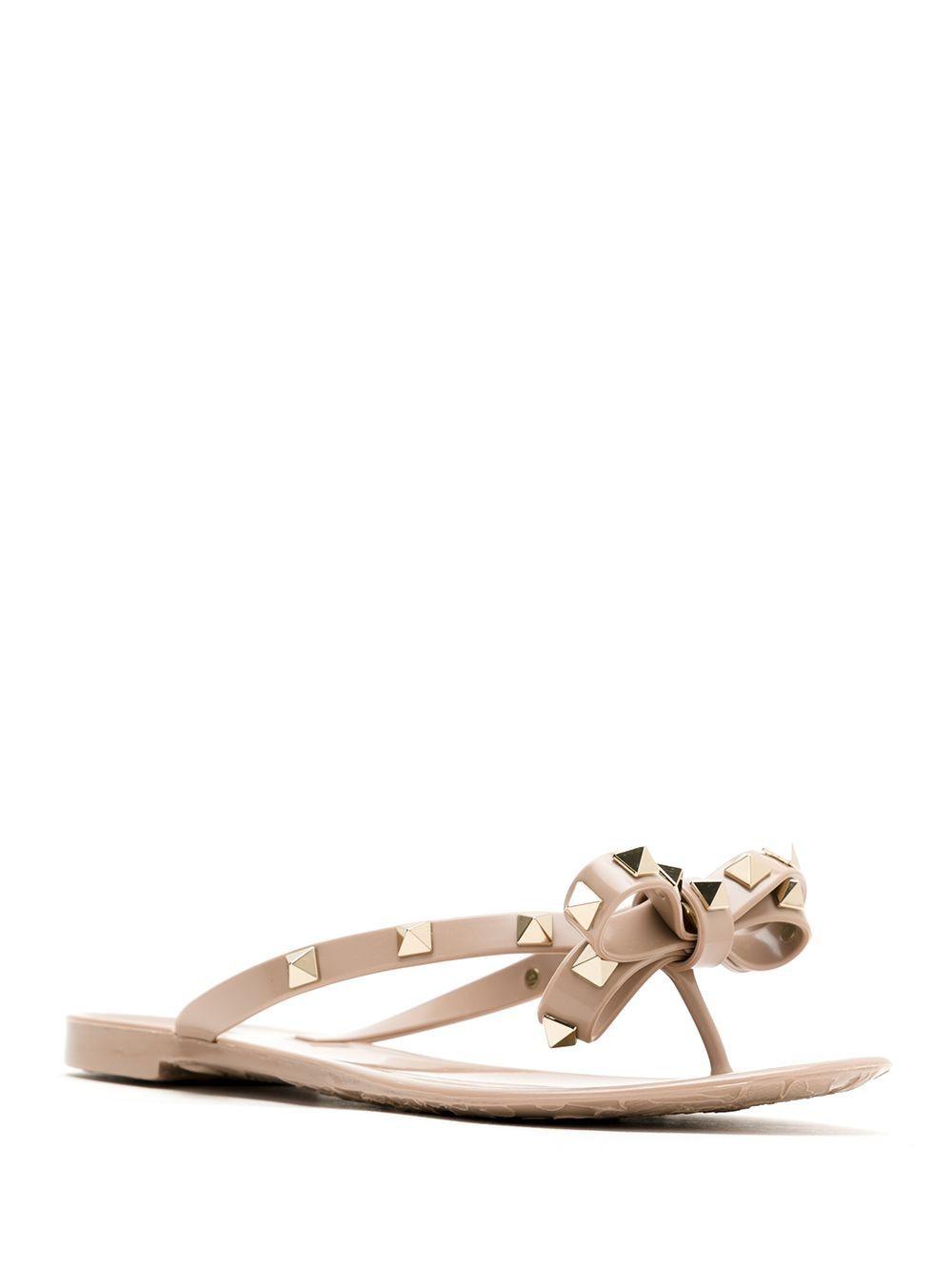 VALENTINO GARAVANI Women Rockstud Rubber Flip Flops In Beige Product Image