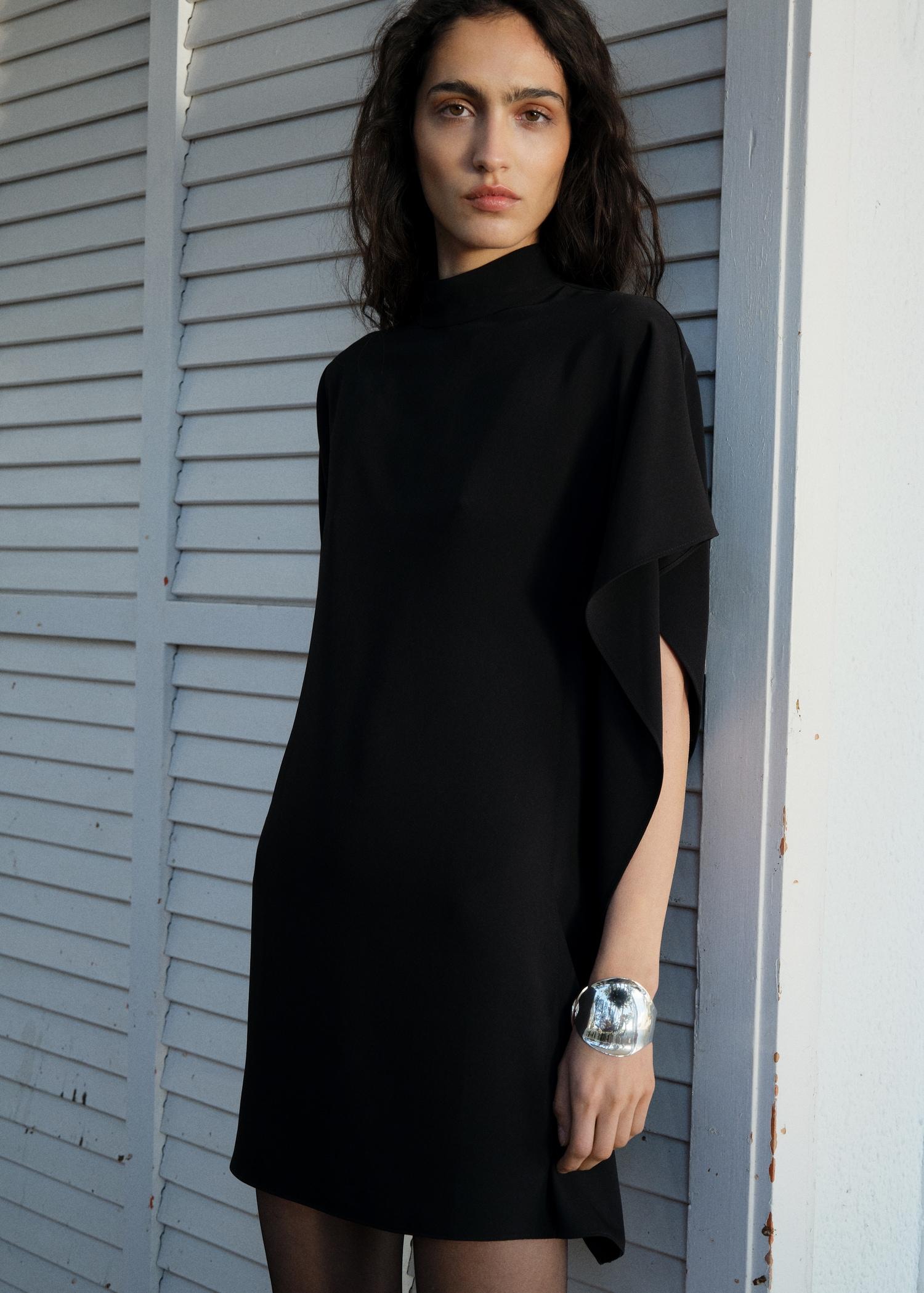 Short asymmetrical sleeve dress - Women | MANGO USA Product Image