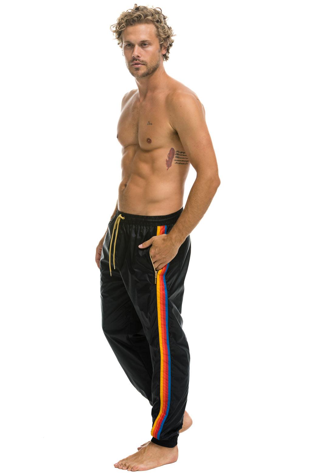 MEN'S 4 STRIPE WIND PANT - BLACK Male Product Image
