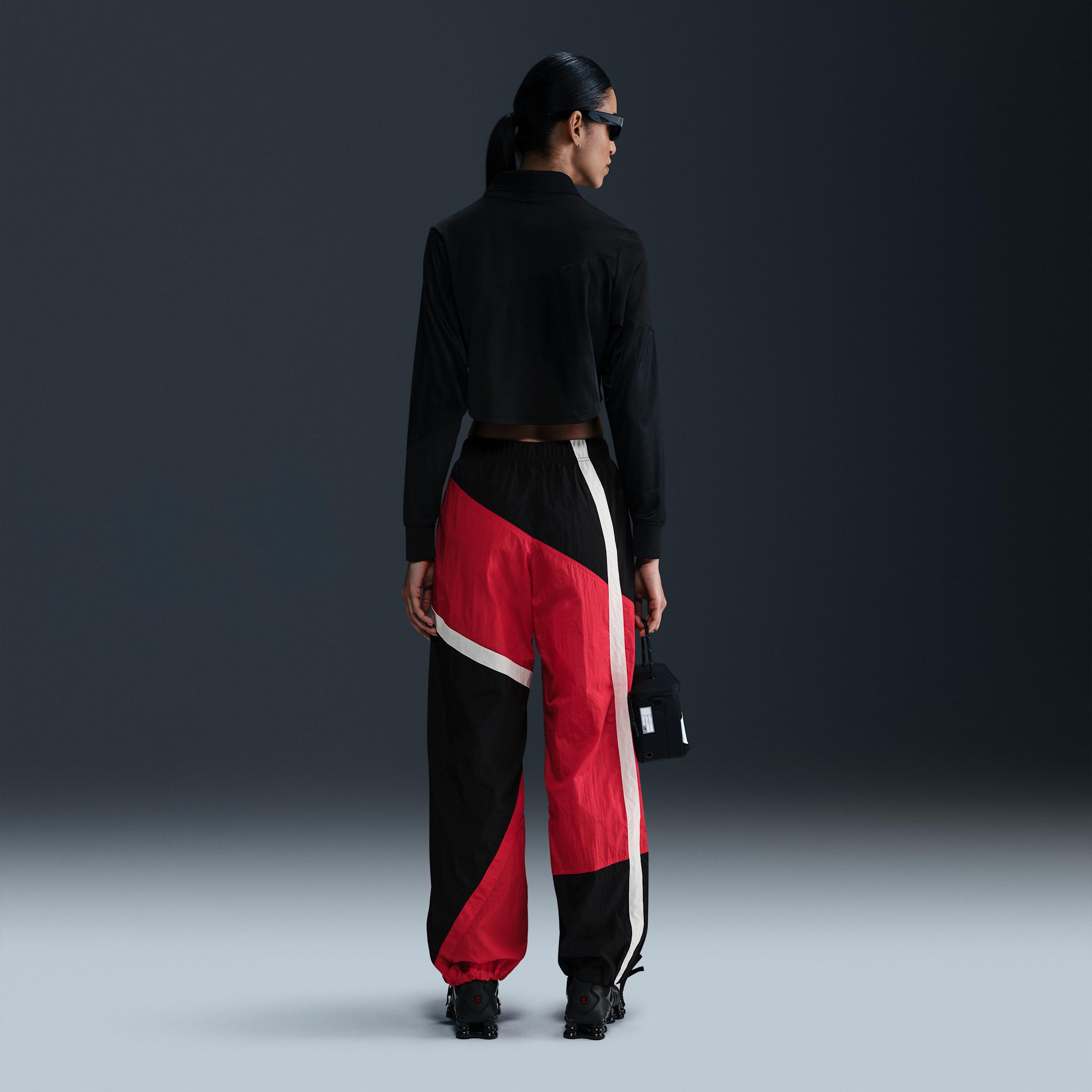 Nike Sportswear Women's Mid-Rise Loose Woven Open-Hem Pants Product Image