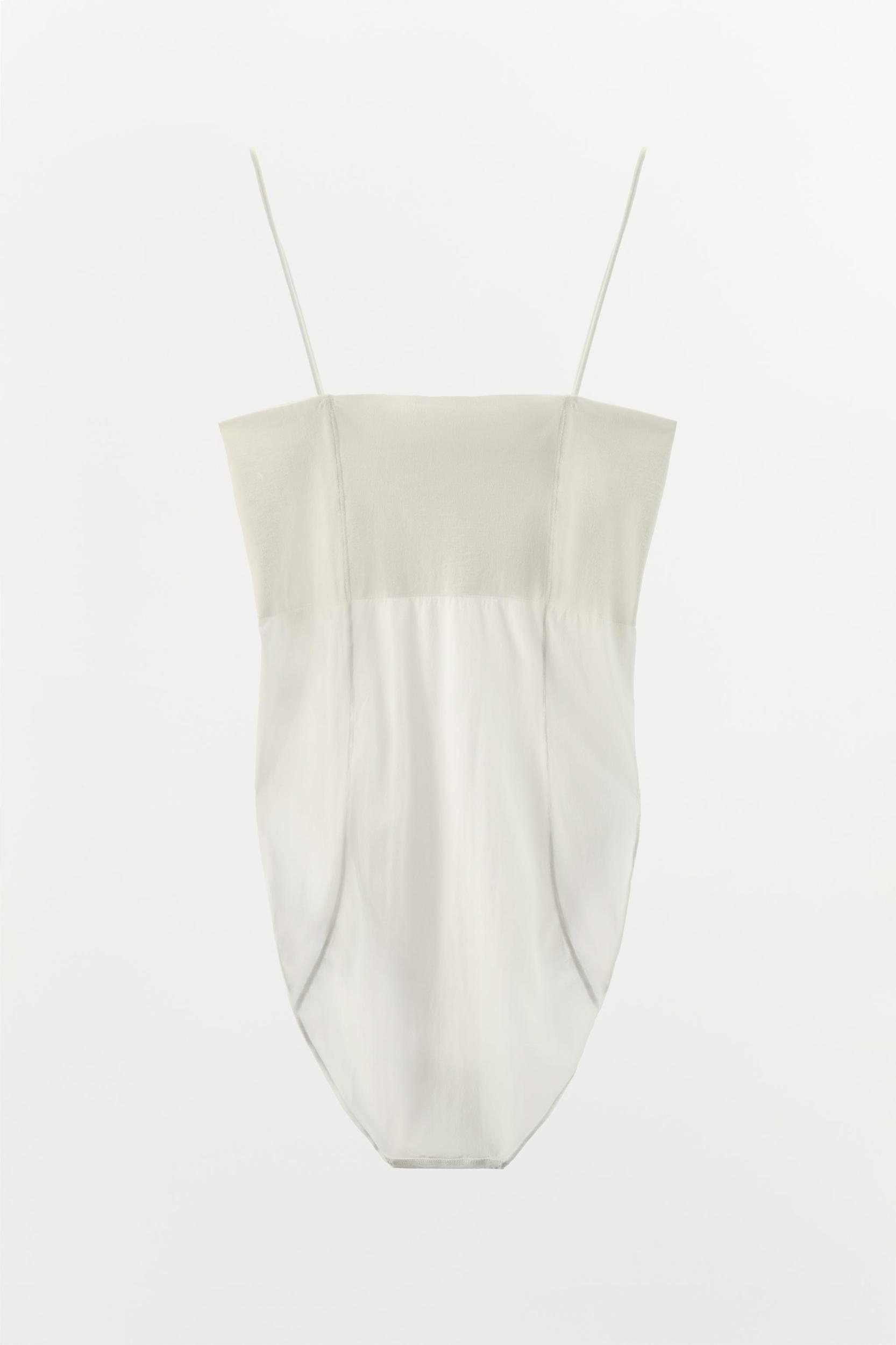 FITTED STRAPPY BODYSUIT WITH SEAMS Product Image