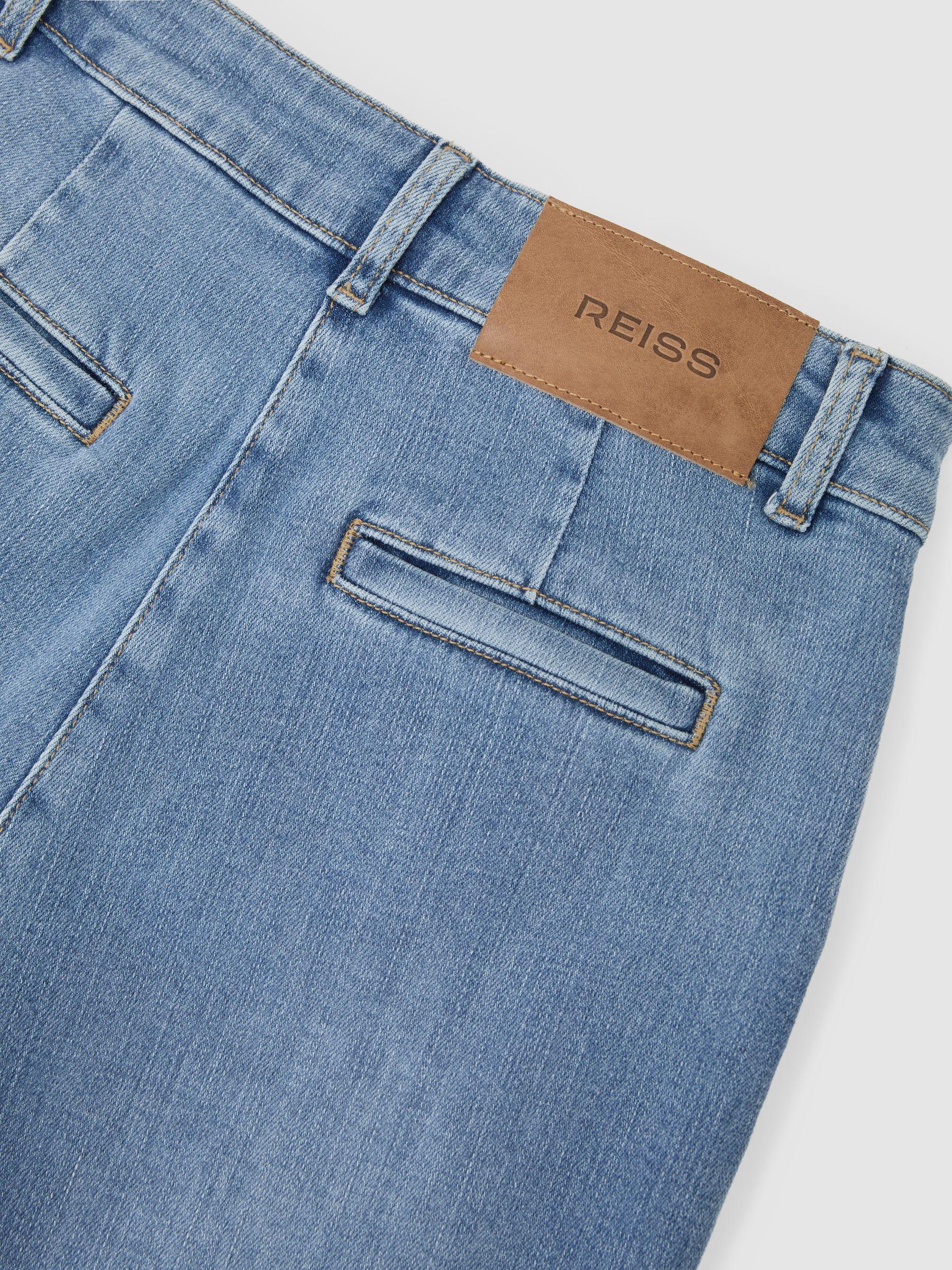 Petite Slim-Leg Mid-Rise Jeans in Mid Blue Product Image
