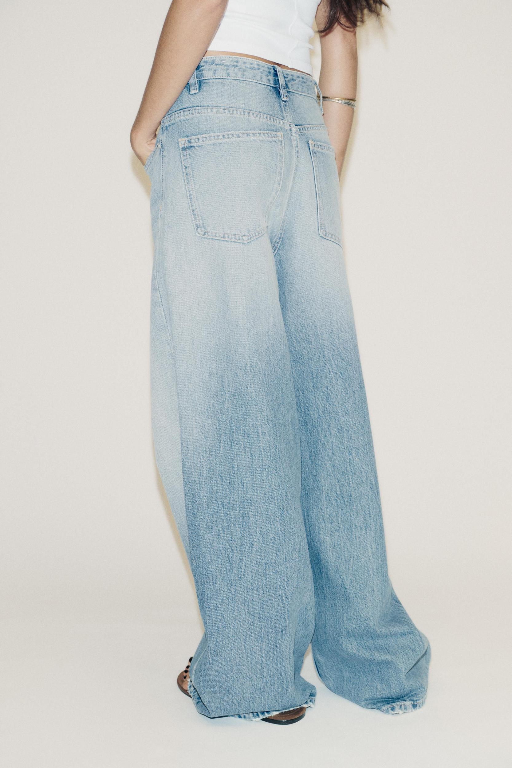 TRF HIGH WAIST CROSSOVER WAIST WIDE LEG JEANS Product Image