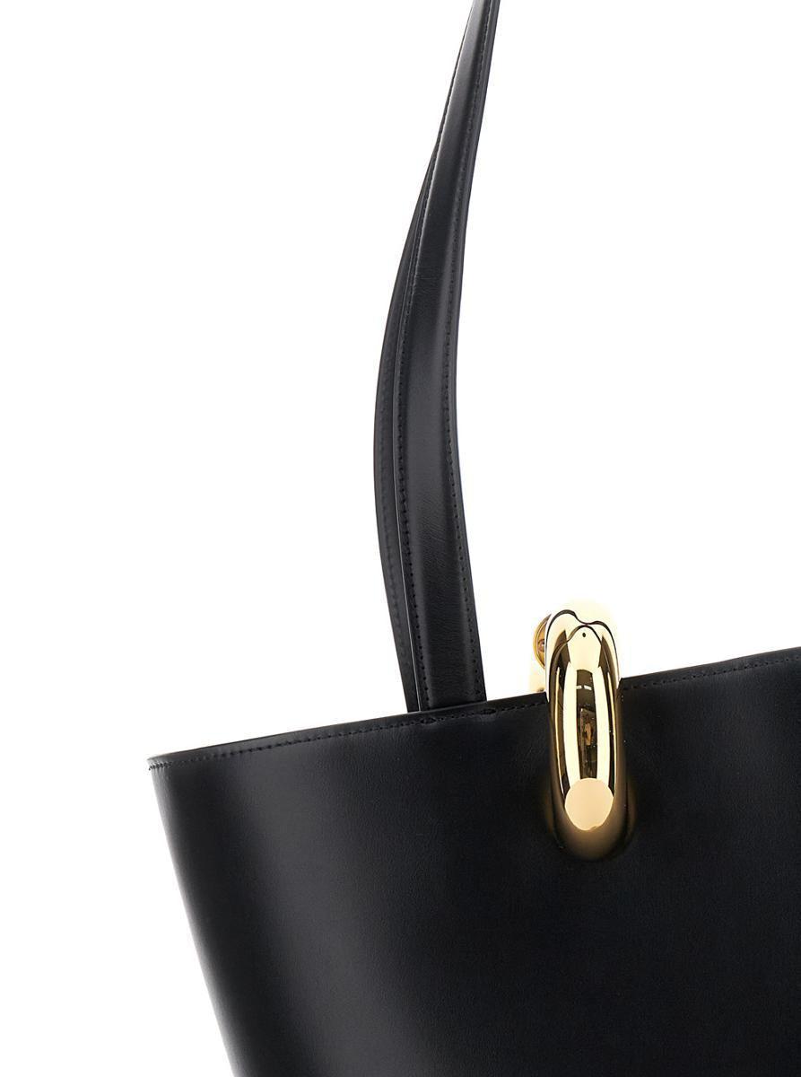 JACQUEMUS The Medium Bambola Asymmetric Leather Bucket Bag In Black 990 Product Image