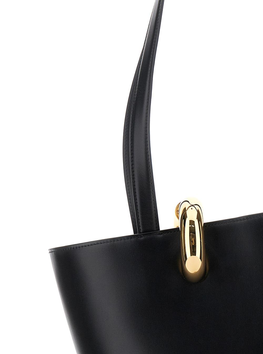 JACQUEMUS The Medium Bambola Asymmetric Leather Bucket Bag In Black 990 Product Image