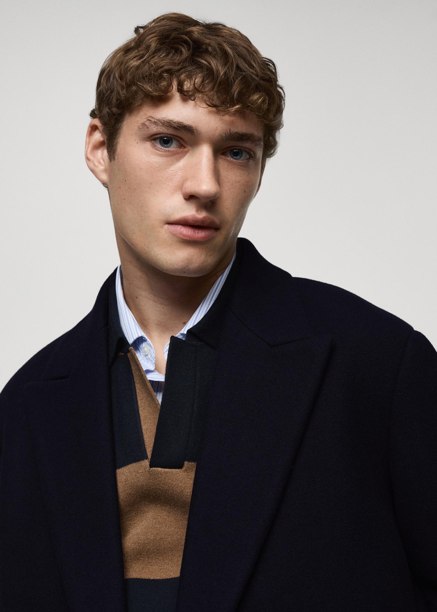 Relaxed-fit long wool coat - Men | MANGO USA Product Image