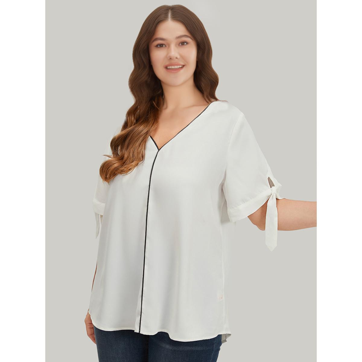 Plus Size Ivory Contrast Trim Knot High Low Hem Blouse Women Office Short sleeve V-neck Office Blouses BloomChic 10/M Product Image
