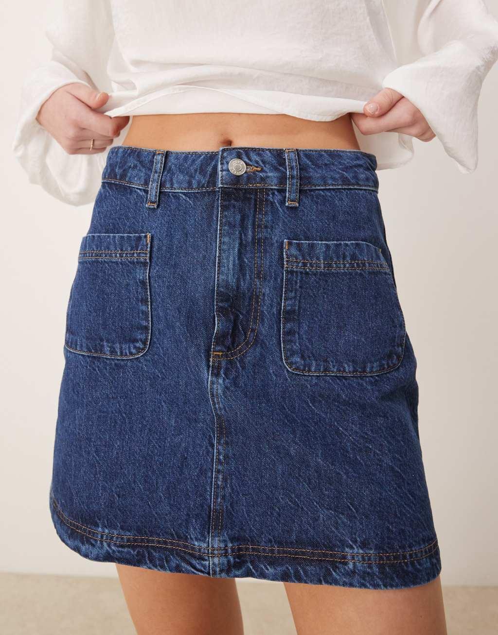ASOS DESIGN denim patch pocket mini skirt in indigo Product Image