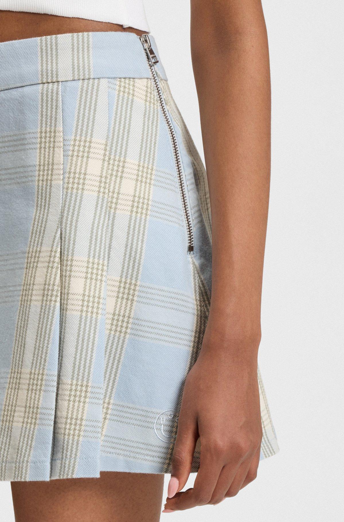 Pleated mini skirt in checked cotton twill Product Image