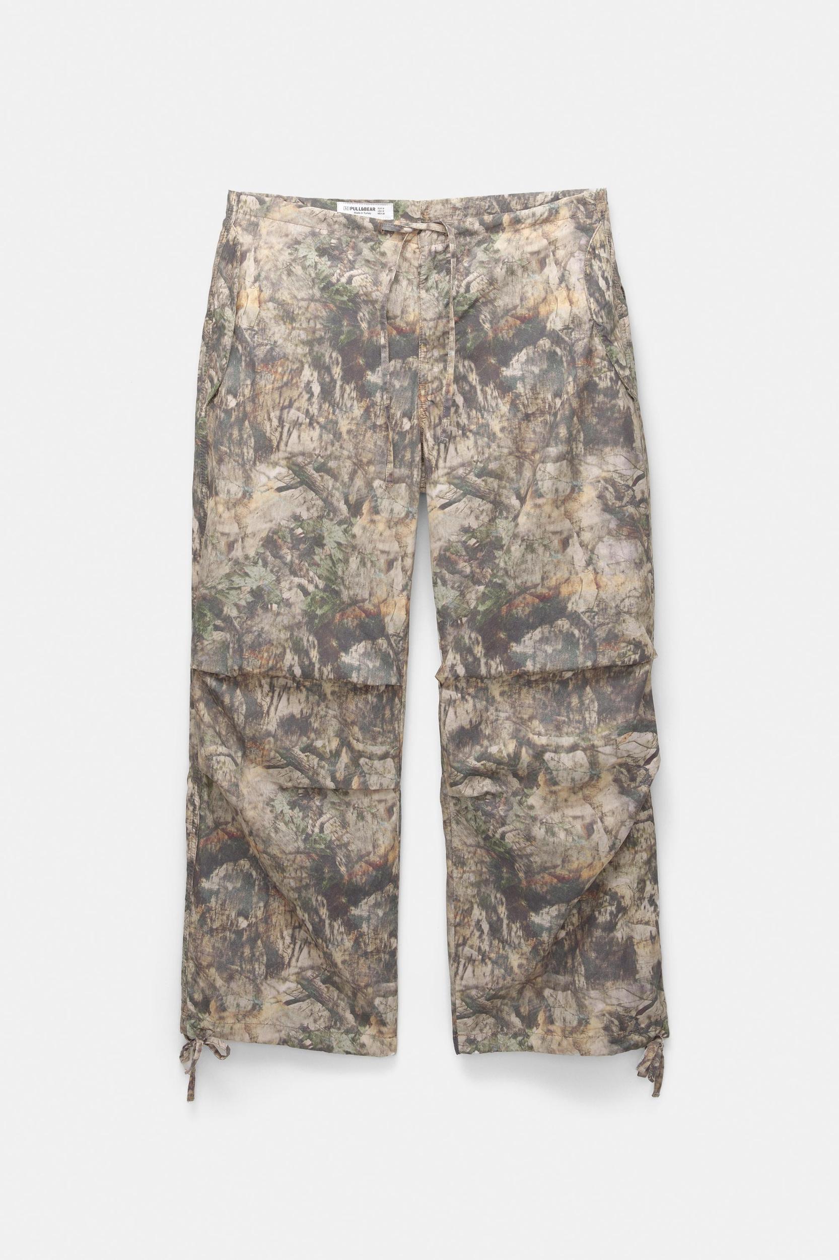 Leaf print parachute trousers Product Image