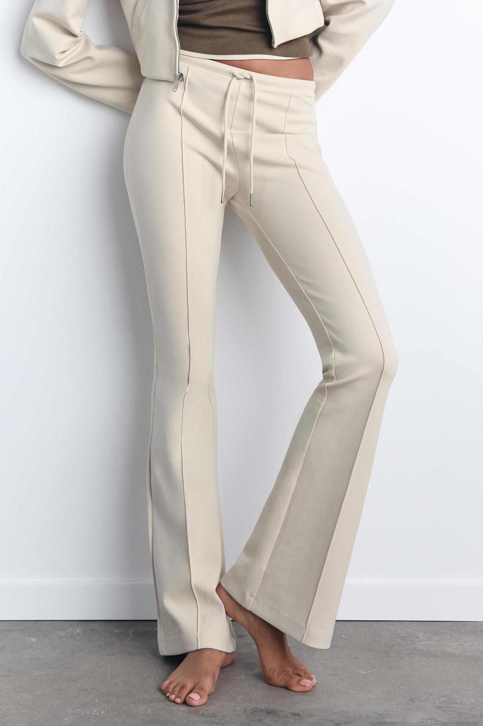FLARE INTERLOCK PANTS WITH SEAMS Product Image