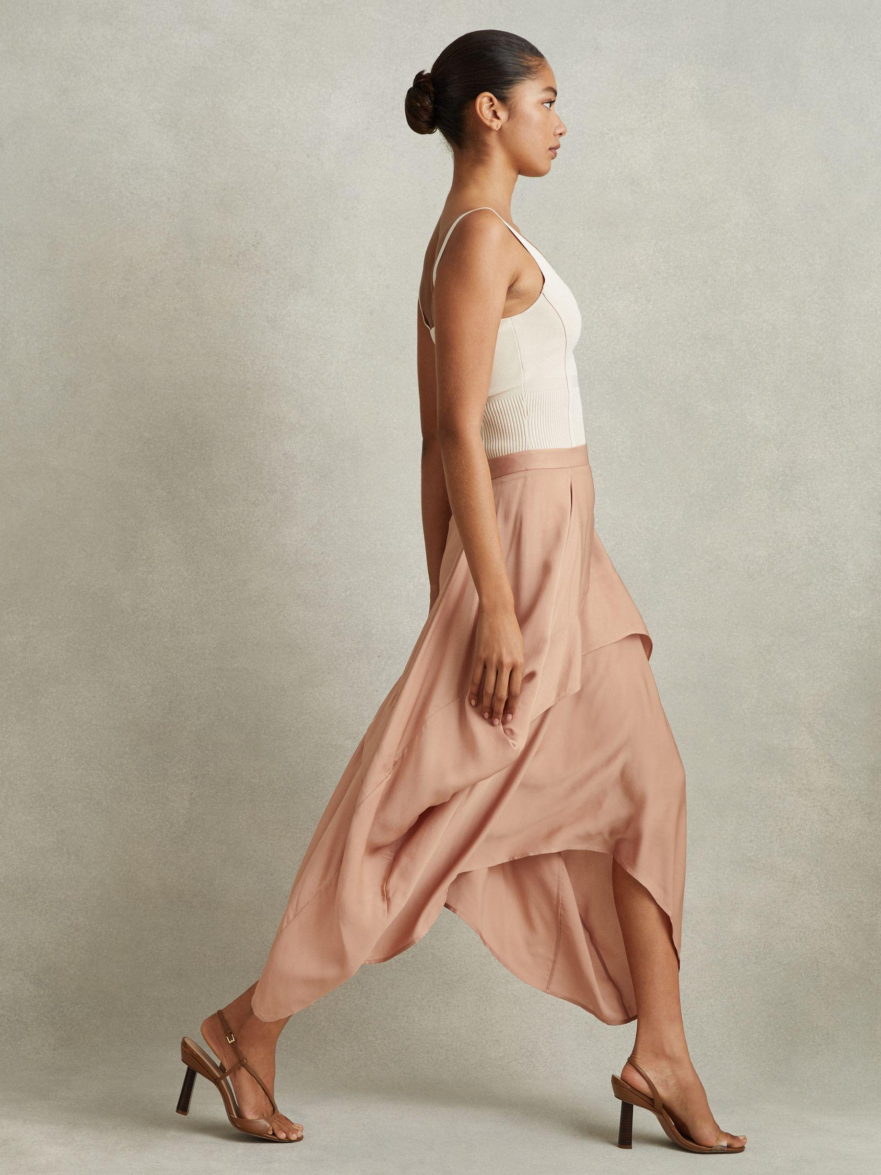 Side Pleat Asymmetric Midi Skirt in Nude Product Image