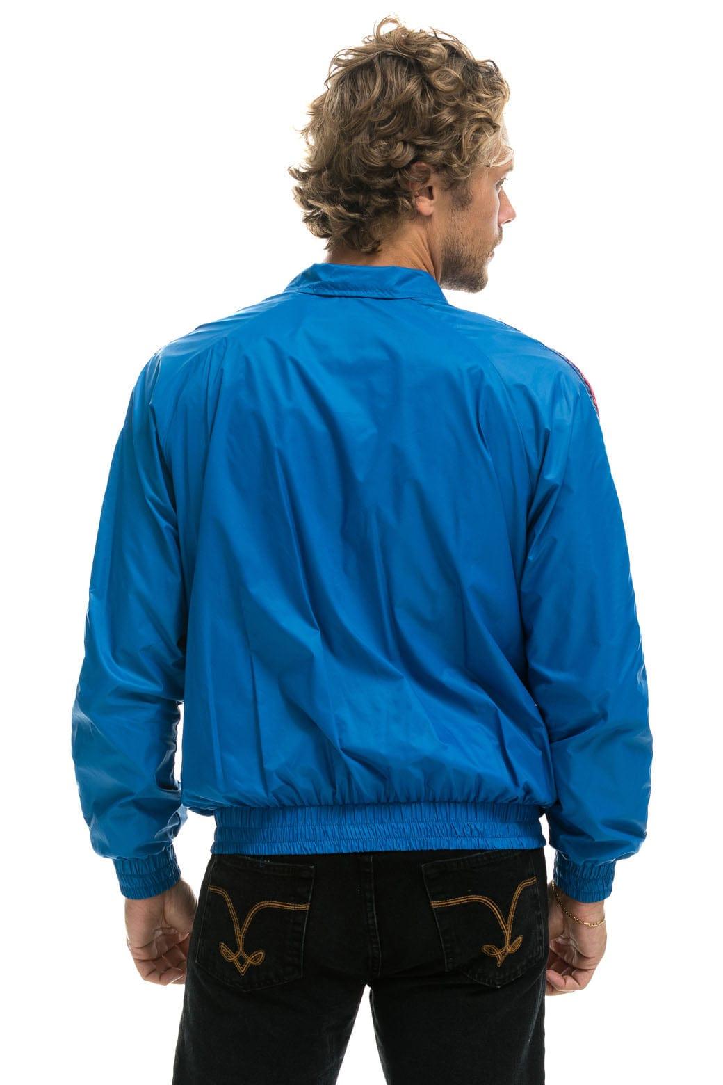 MEN'S 4 STRIPE WINDBREAKER -  SNORKEL BLUE Male Product Image