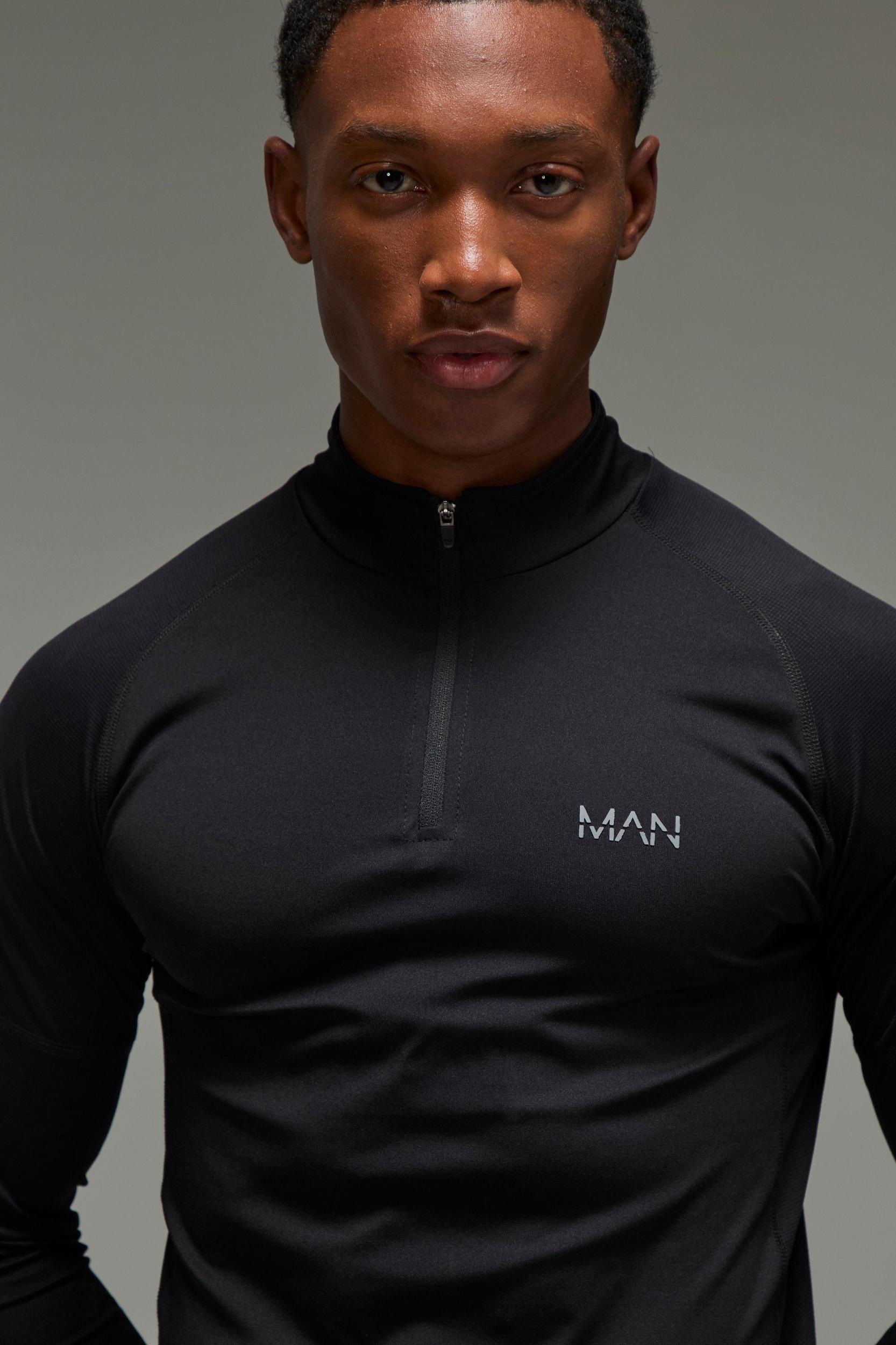 Man Active Muscle Fit Grid Panel Performance 1/4 Zip | boohooMAN USA Product Image