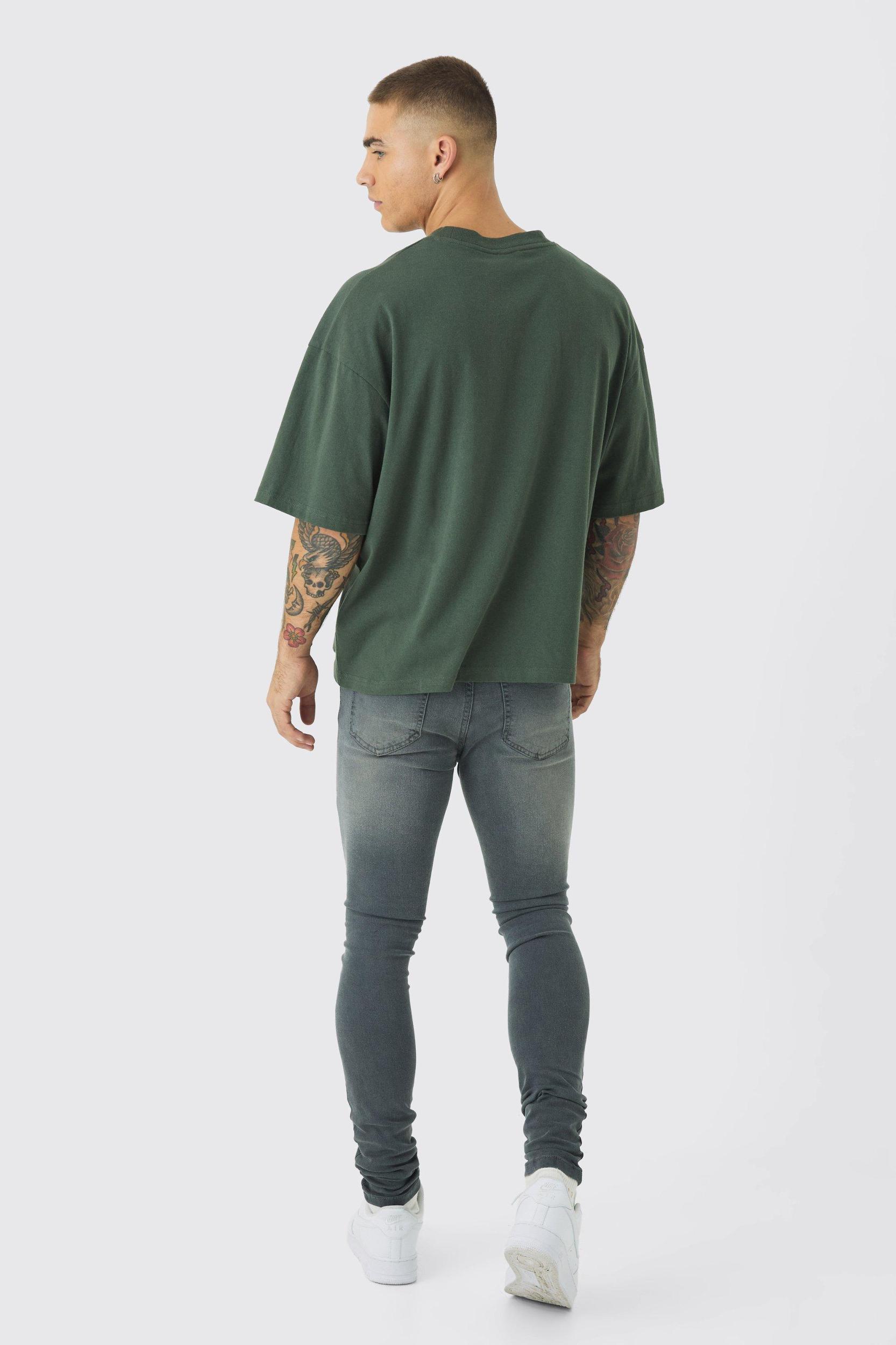 Super Skinny Stretch Biker Rip & Repair Paint Splat Jeans | boohooMAN USA Product Image