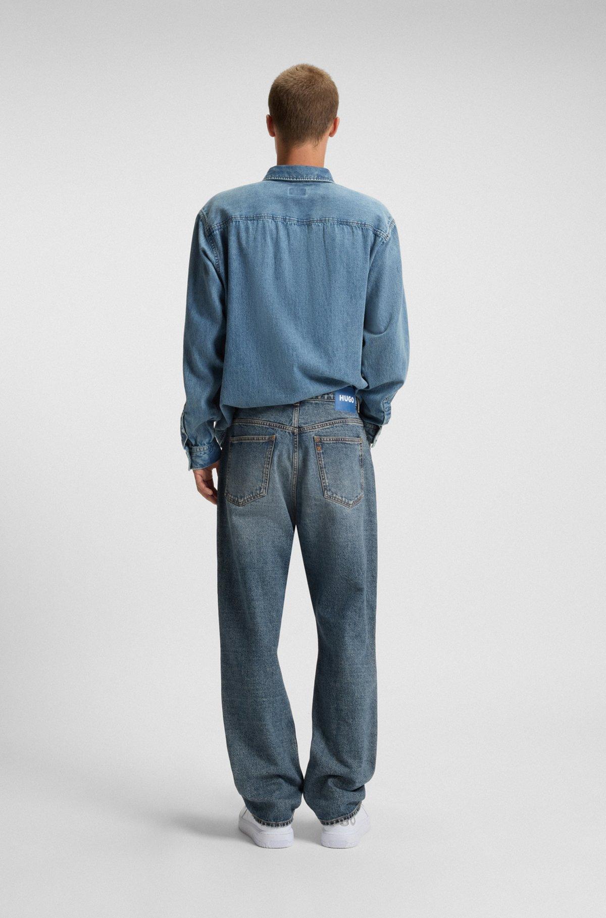 Baggy-fit jeans in blue distressed denim Product Image