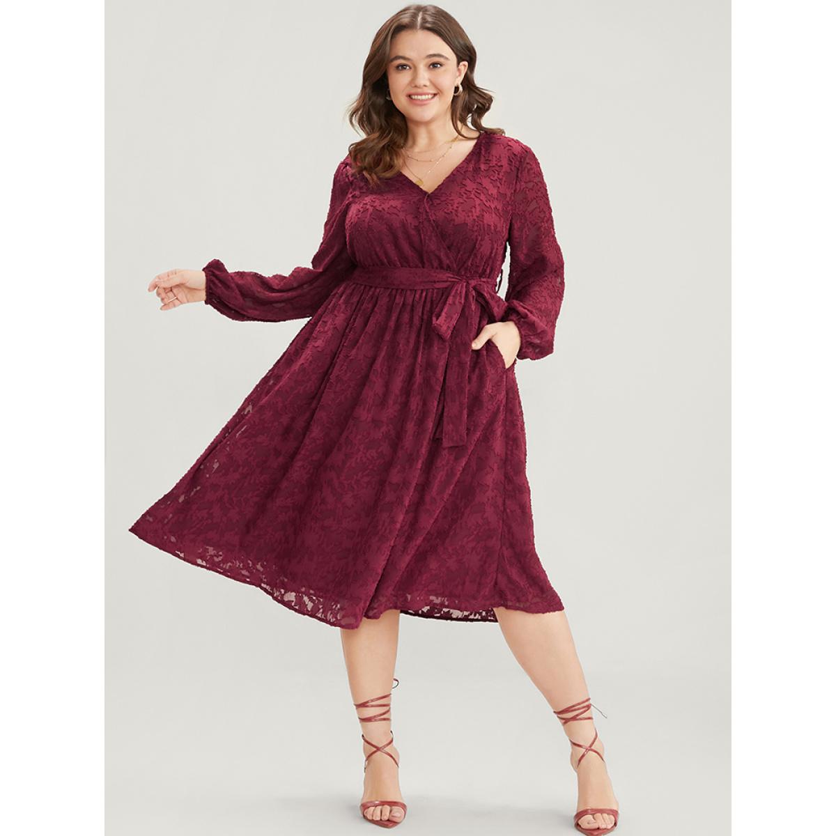 Plus Size Floral Pocket Lantern Sleeve Belted Surplice Neck Dress Scarlet Women Glamour Belted V-neck Long Sleeve Curvy Midi Dress BloomChic 22-24/3X Product Image
