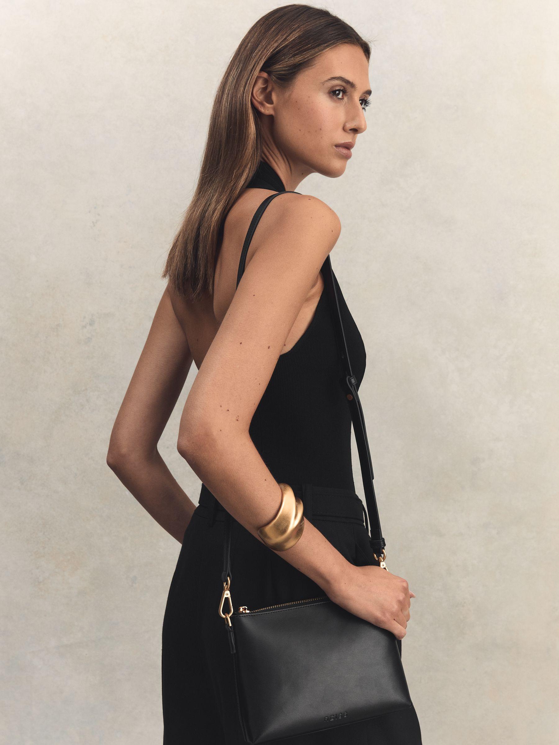 Leather Double Strap Pouch Bag in Black Product Image