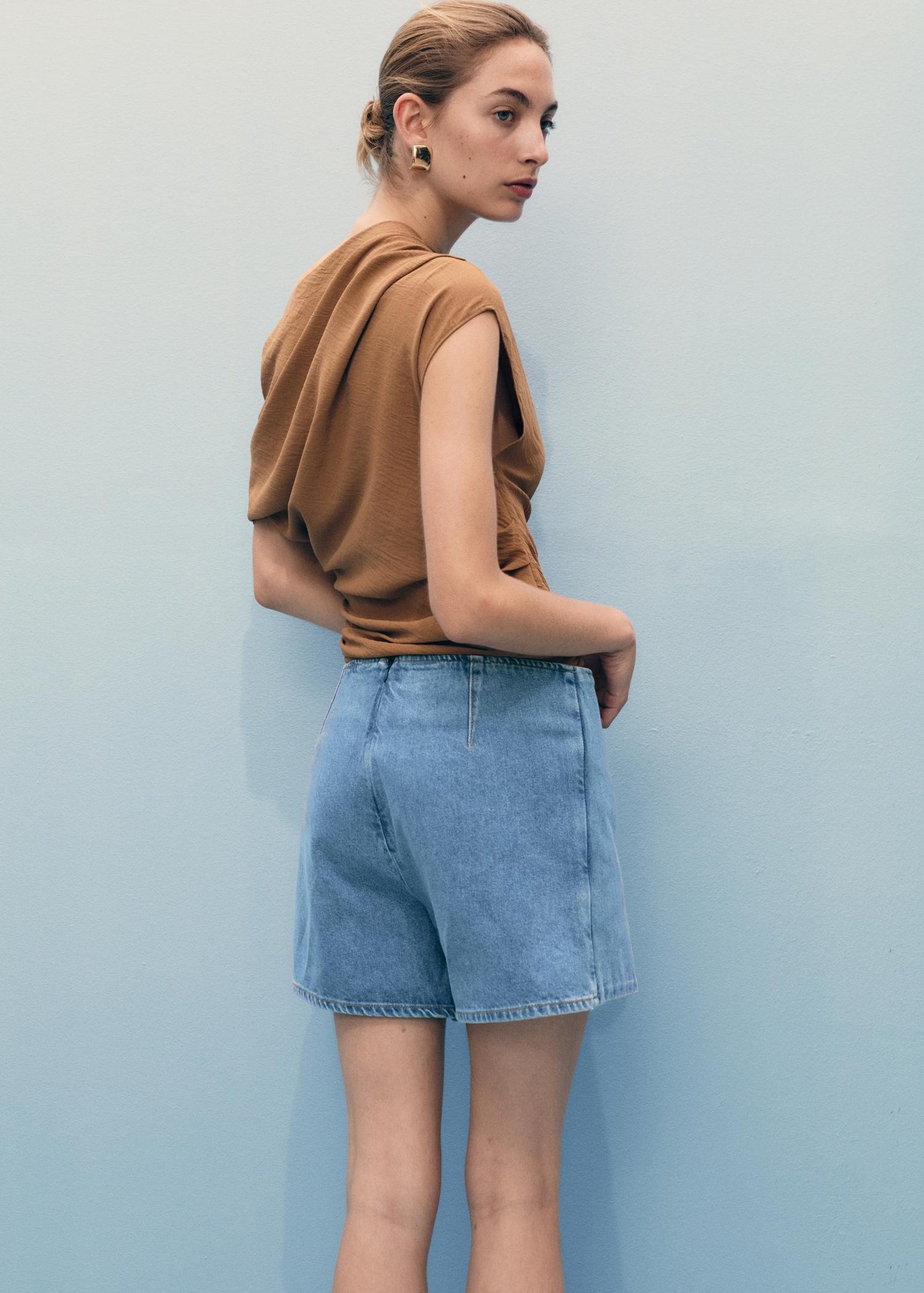 Wrapped denim skort - Women | MANGO USA Product Image