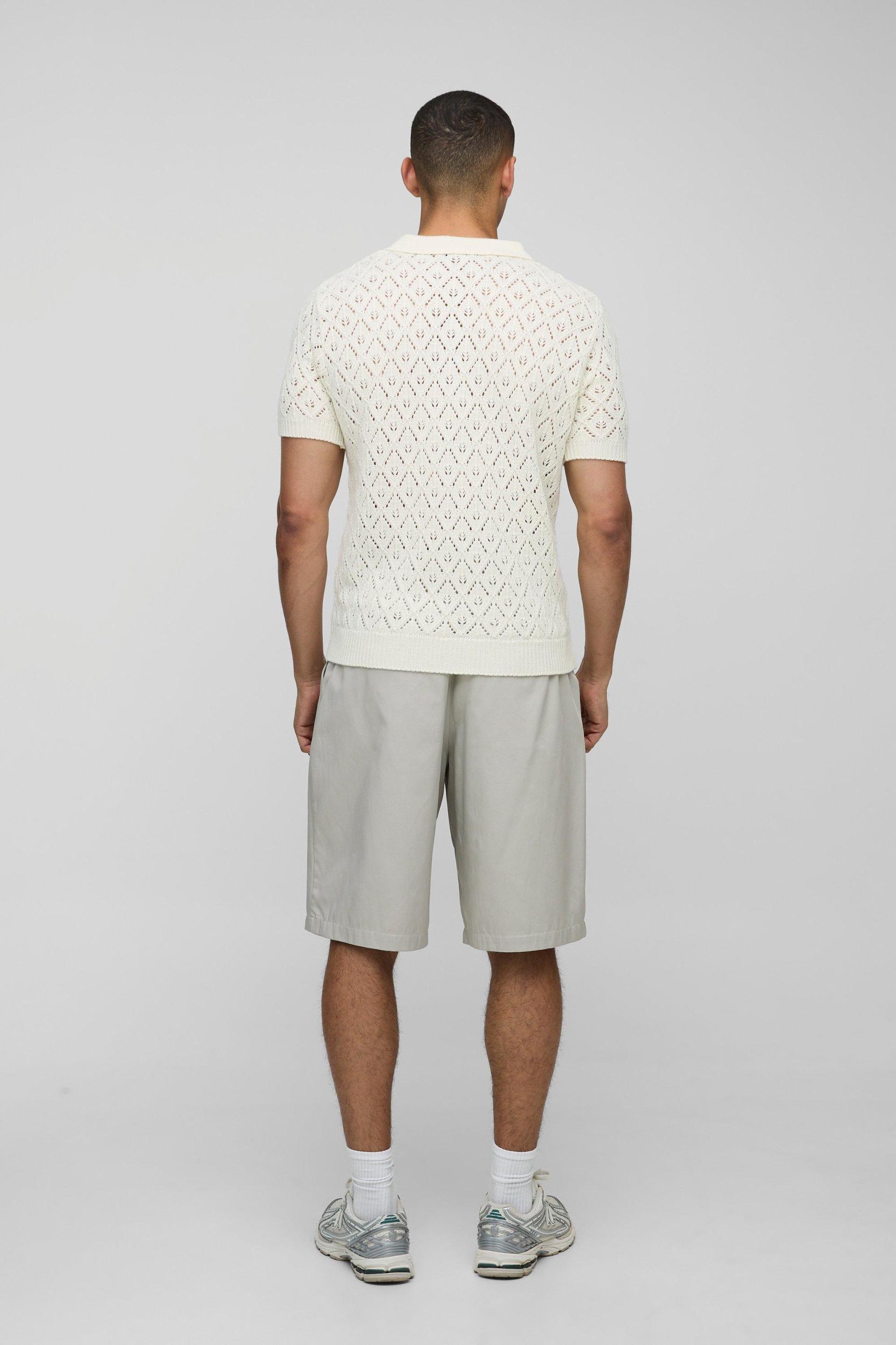 MAN Regular Fit Open Stitch Knitted Polo | boohooMAN USA Product Image