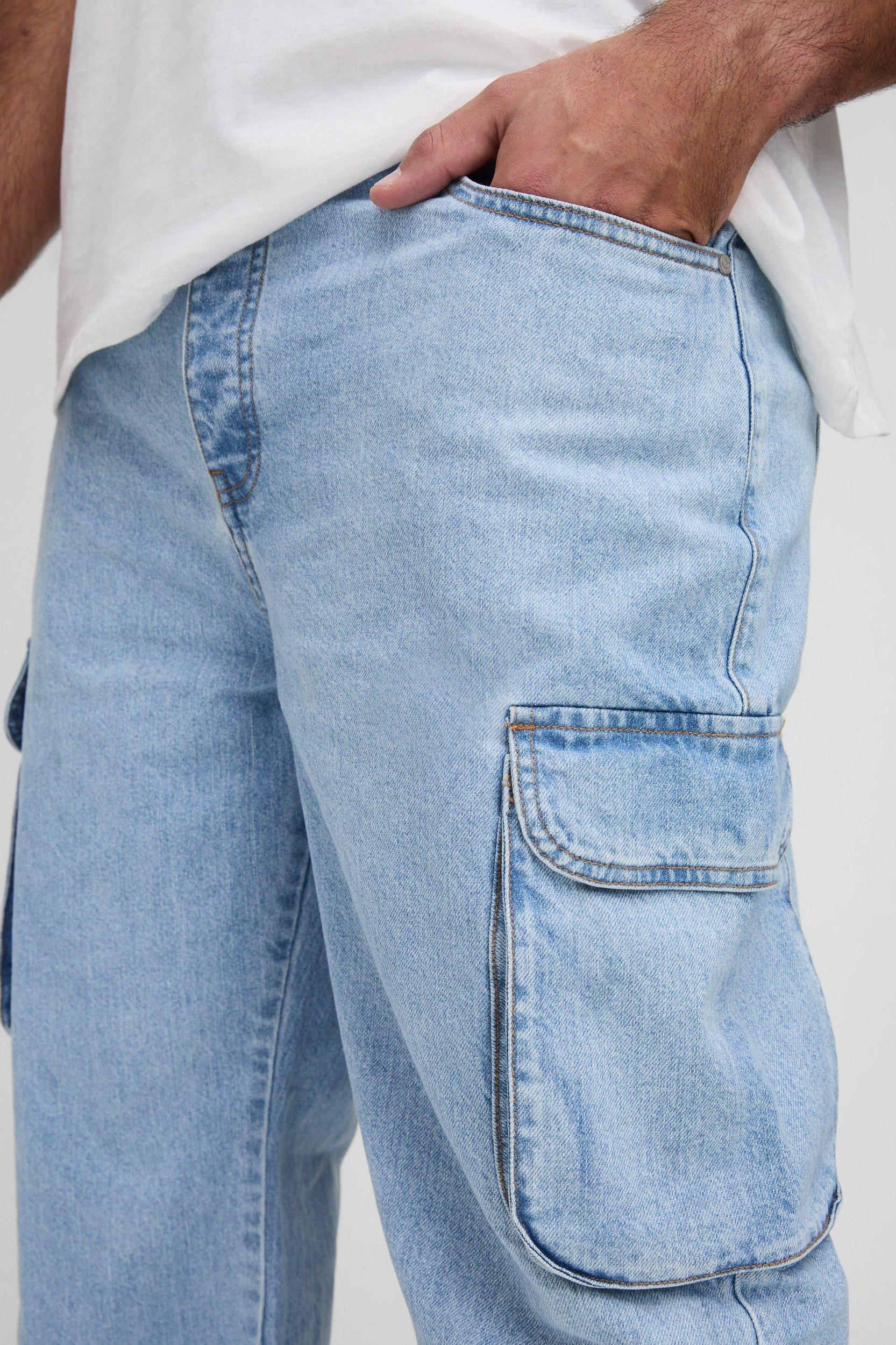 Plus Relaxed Rigid Flare Cargo Jeans | boohooMAN USA Product Image