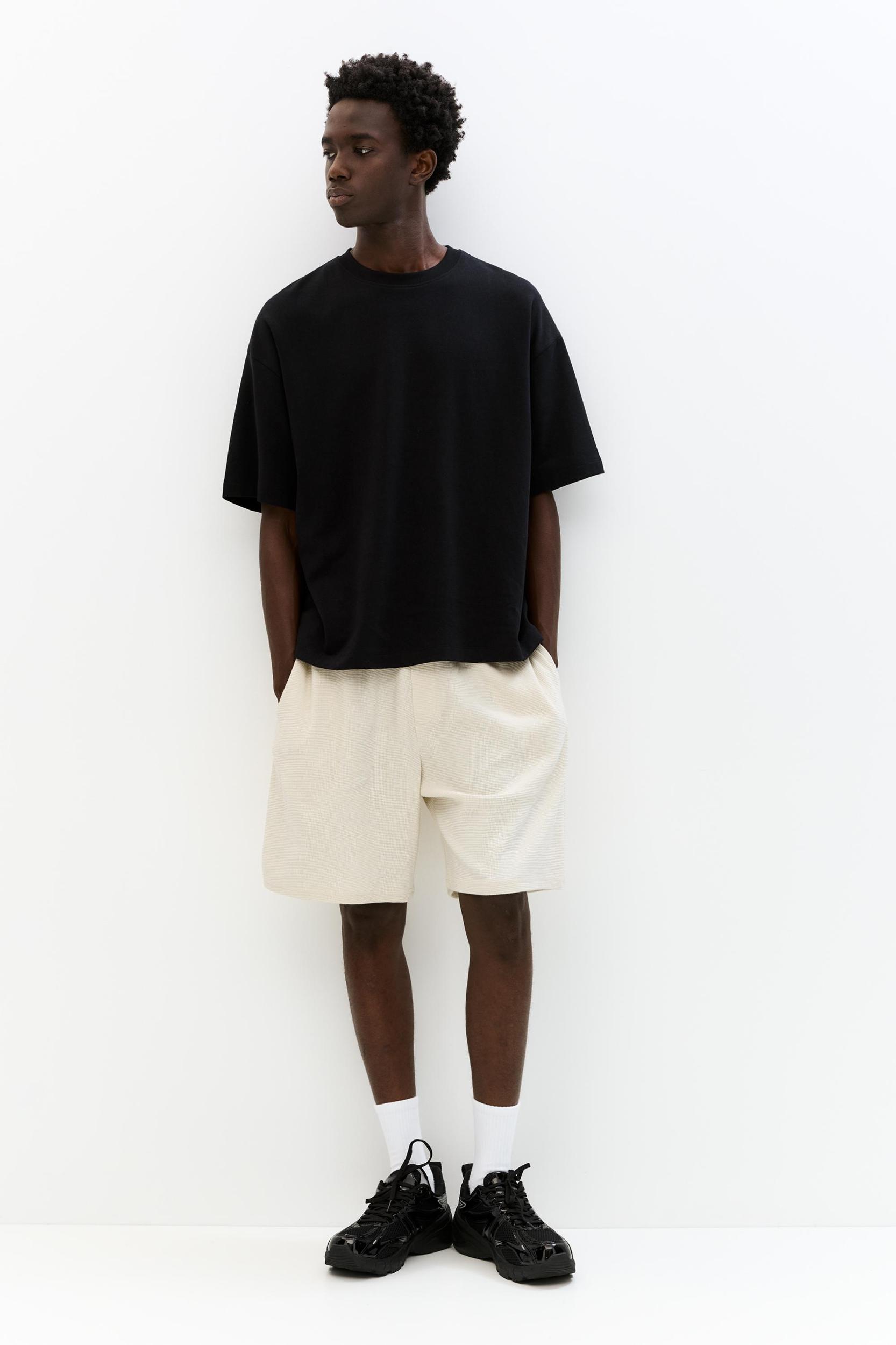 Jogger Bermuda shorts in waffle-knit fabric Product Image