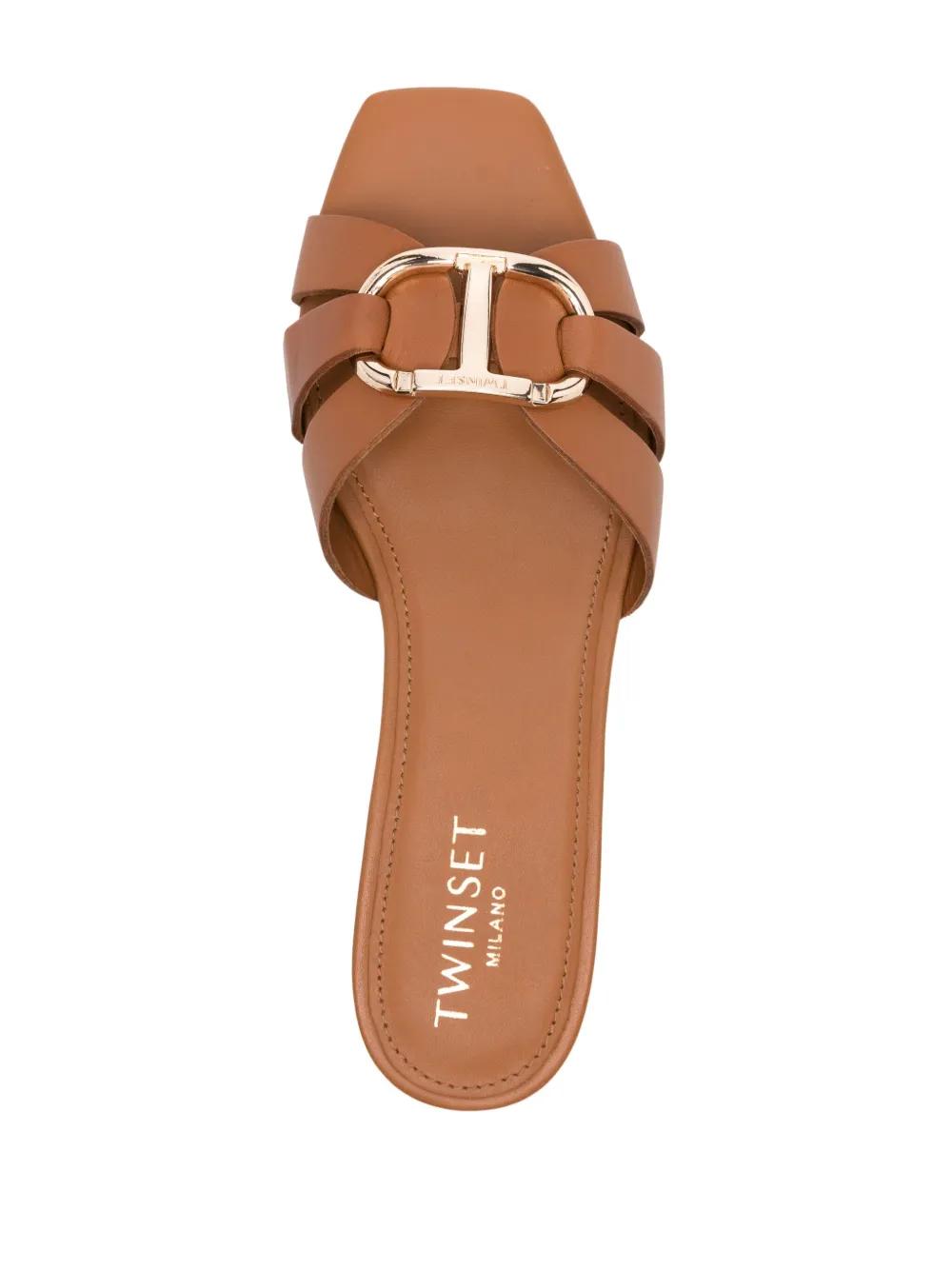 Oval T-plaque leather slides Product Image