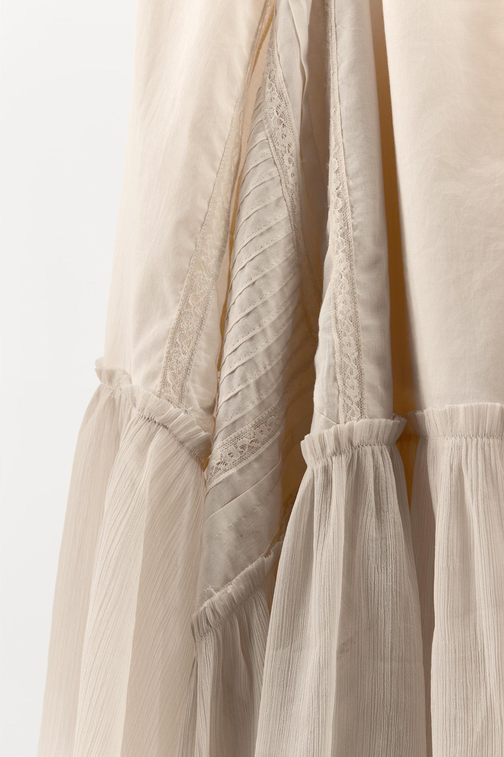 ASYMMETRIC PLEATED SKIRT Product Image