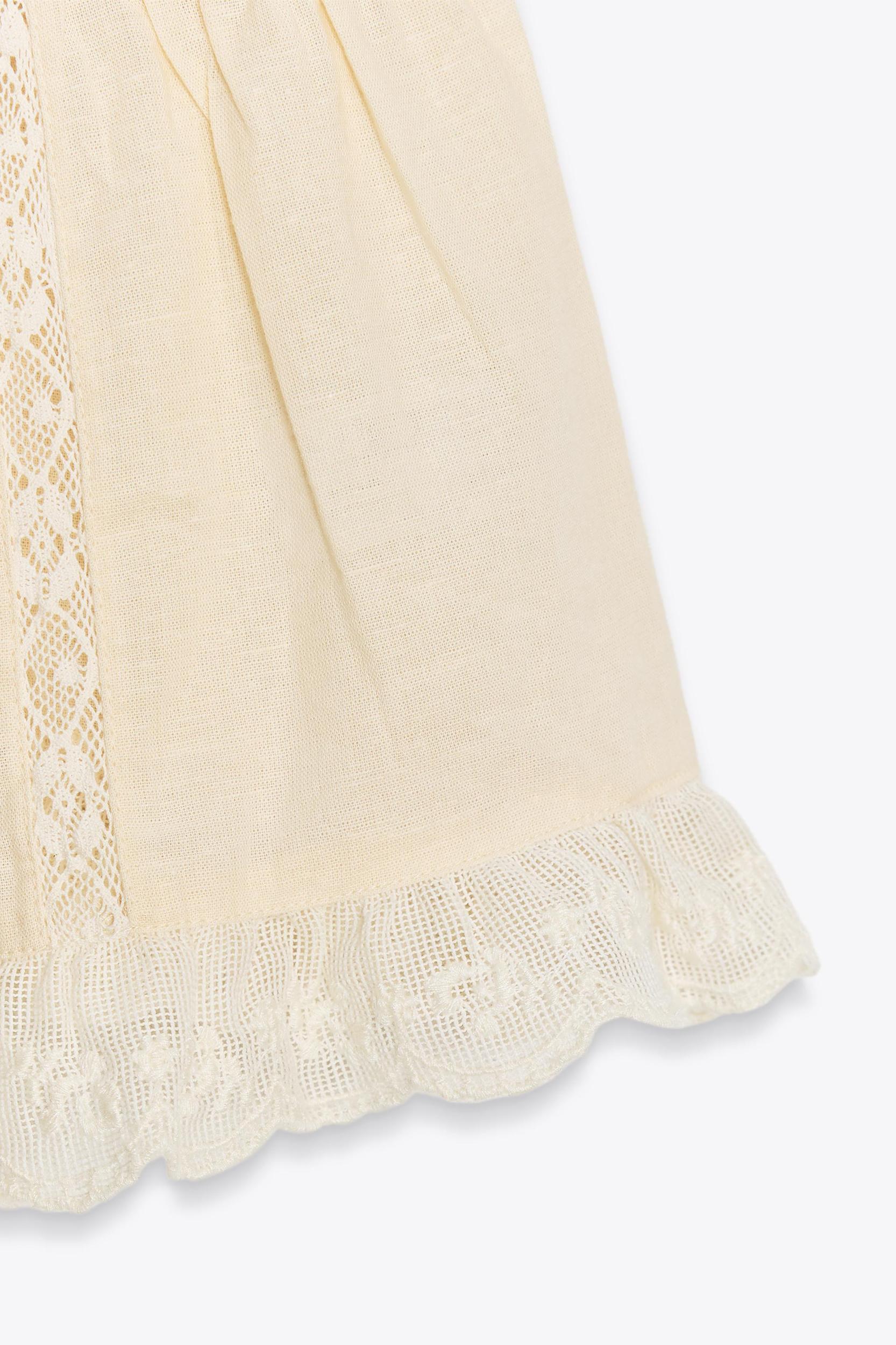 EMBROIDERED ELASTICIZED TOP Product Image