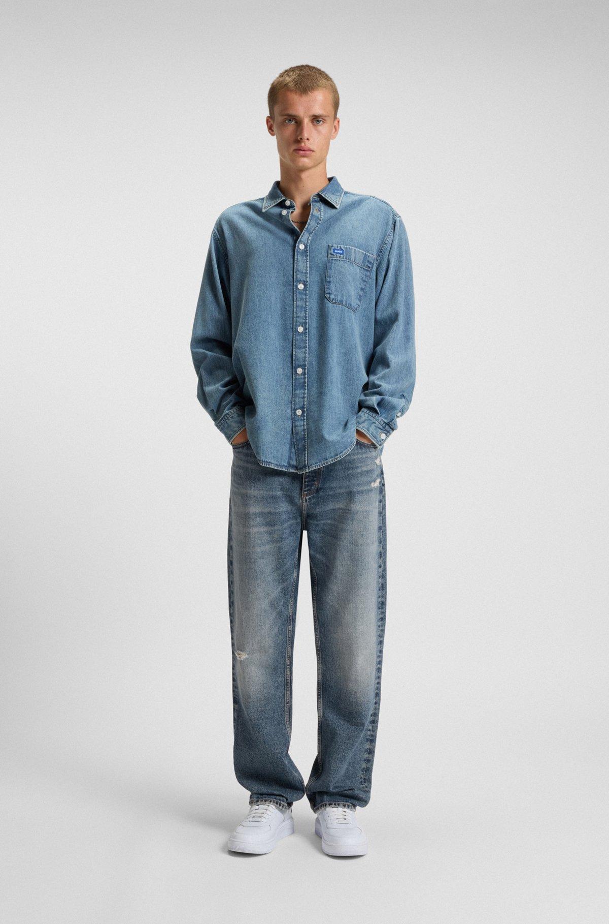 Baggy-fit jeans in blue distressed denim Product Image