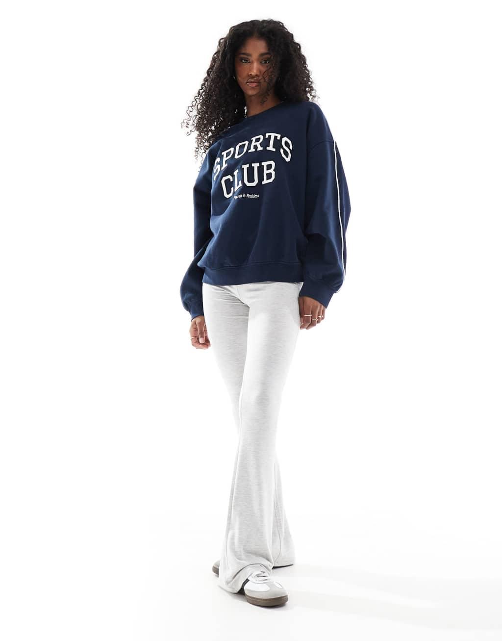 4th & Reckless sports club embroidered logo oversized sweatshirt in navy Product Image
