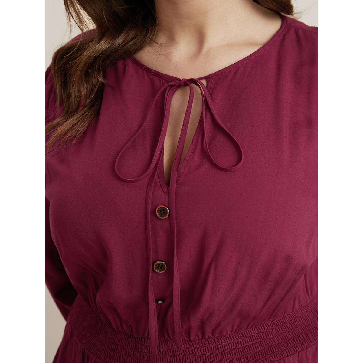 Plus Size Solid Pocket Button Detail Tie Neck Shirred Ruffles Dress Burgundy Women Elegant Pocket V-neck Long Sleeve Curvy Midi Dress BloomChic 14-16/1X Product Image