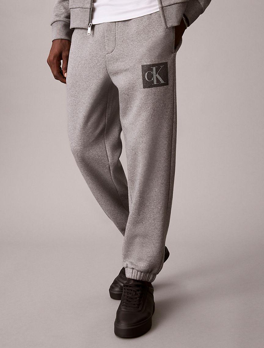 Fleece Layered Monogram Graphic Sweatpants Product Image