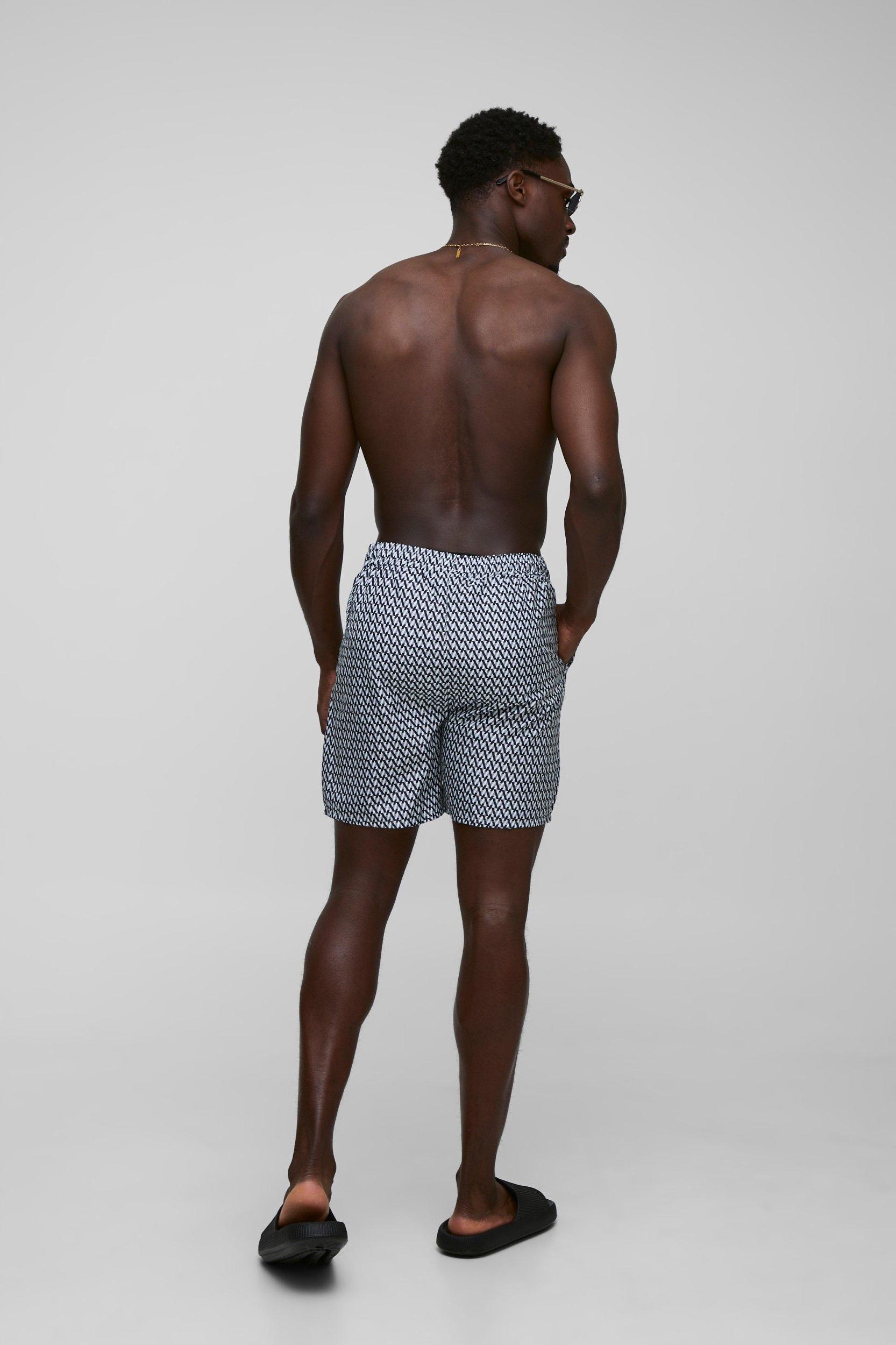 Abstract Printed Mid Length Swim Short | boohooMAN USA Product Image