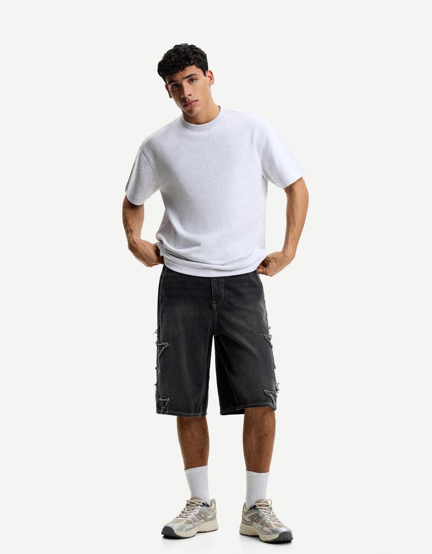 Baggy Bermuda shorts with patches Product Image