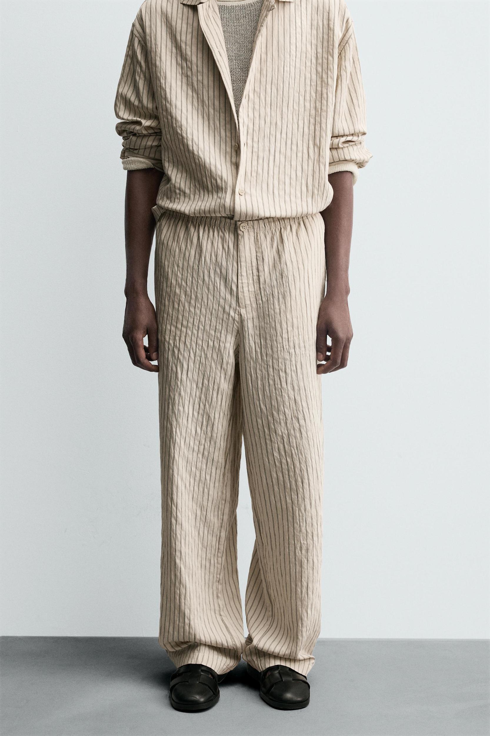 WRINKLED EFFECT STRIPED FLOWY PANTS Product Image