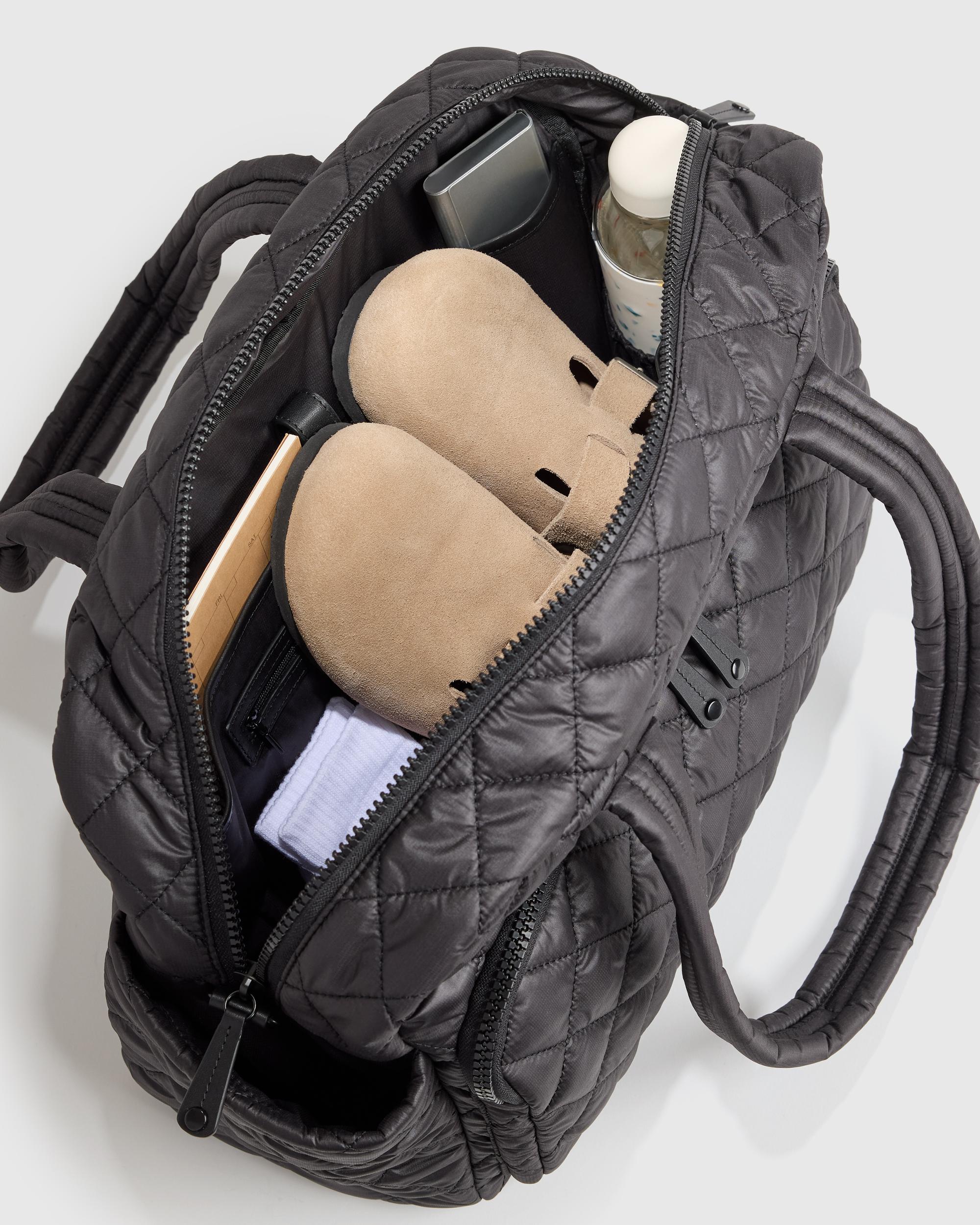 Quince | Women's Transit Quilted Duffle Bag in Black, Nylon Product Image