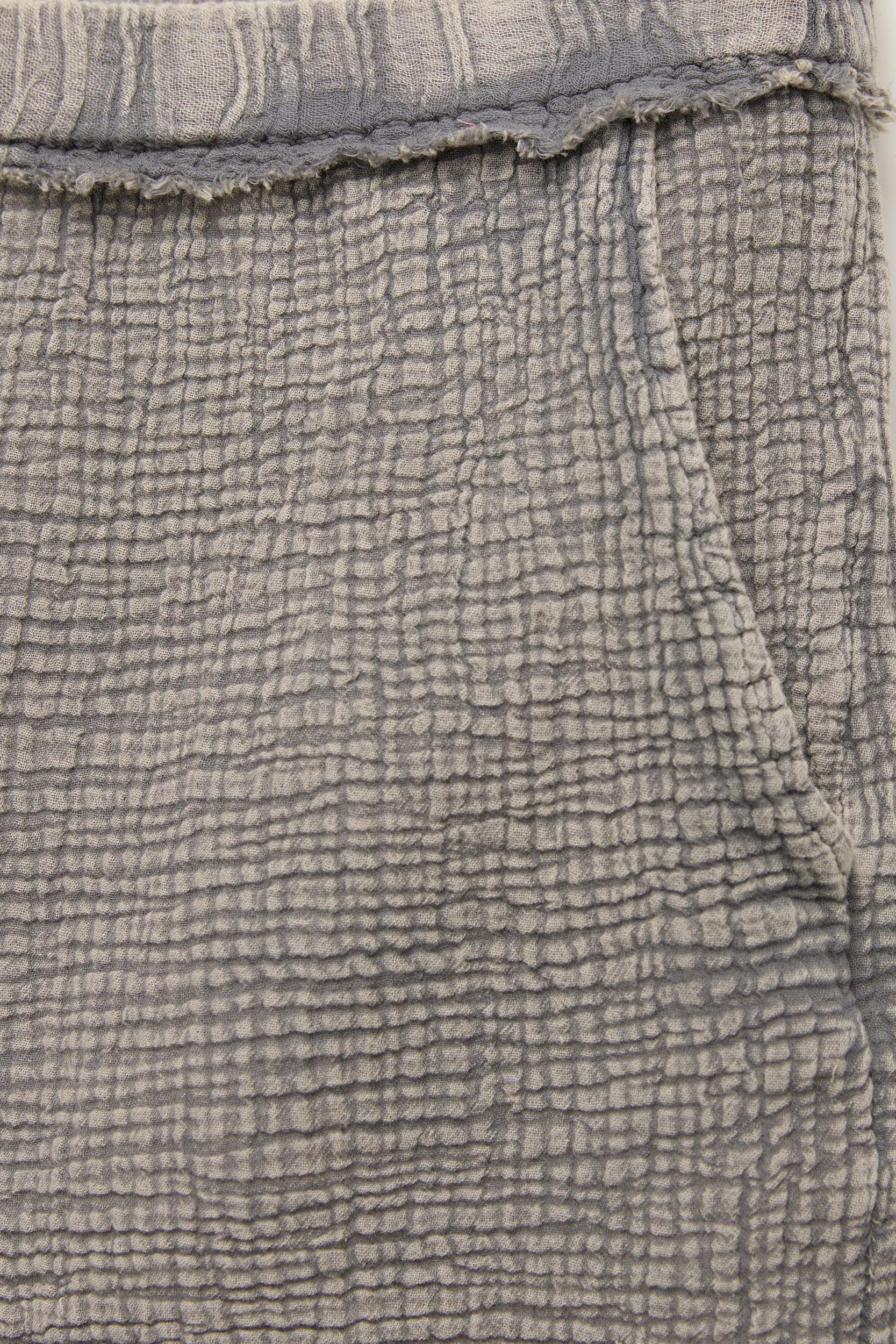 Creased-effect shorts Product Image