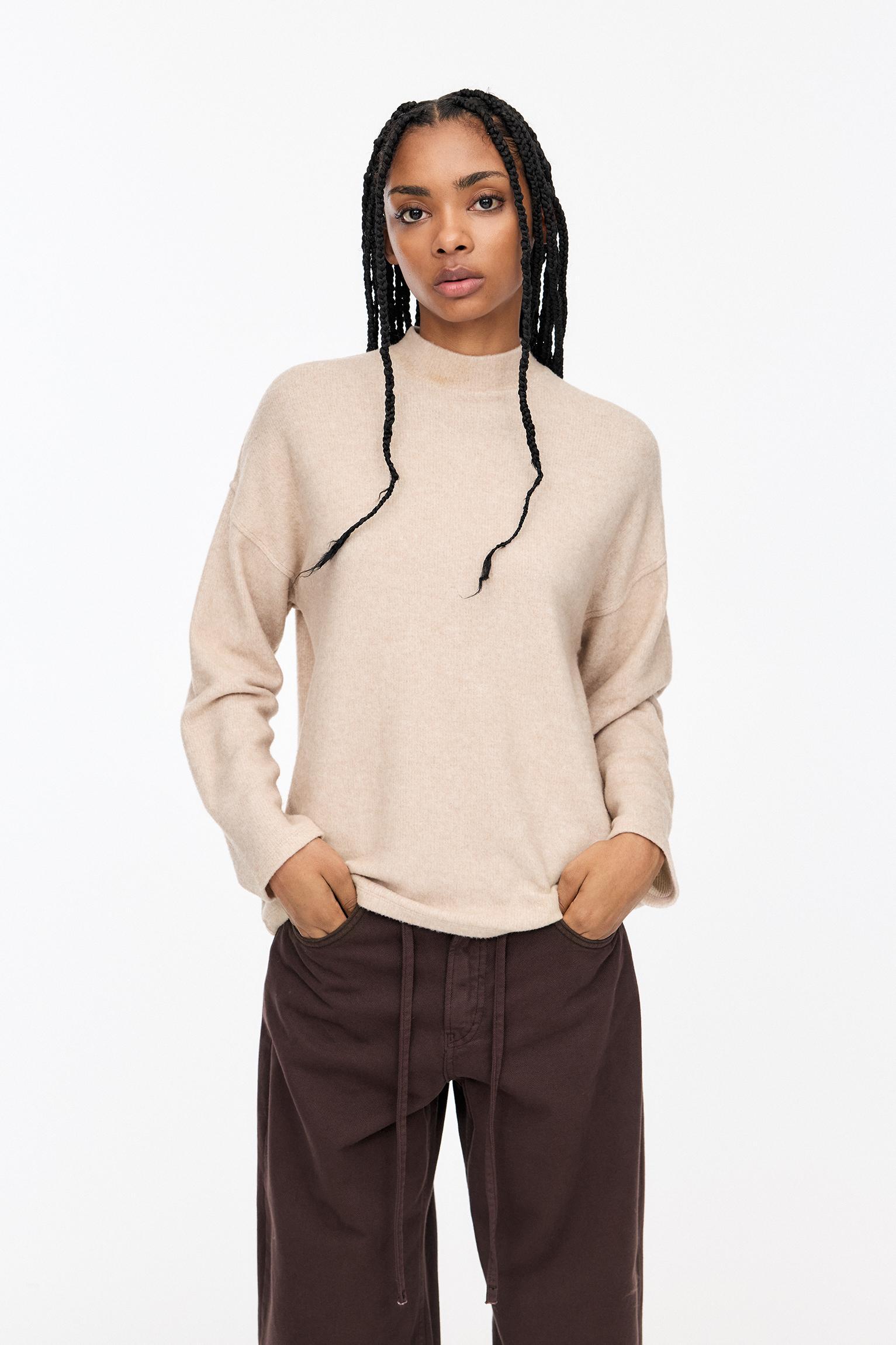 Soft touch high neck sweater Product Image