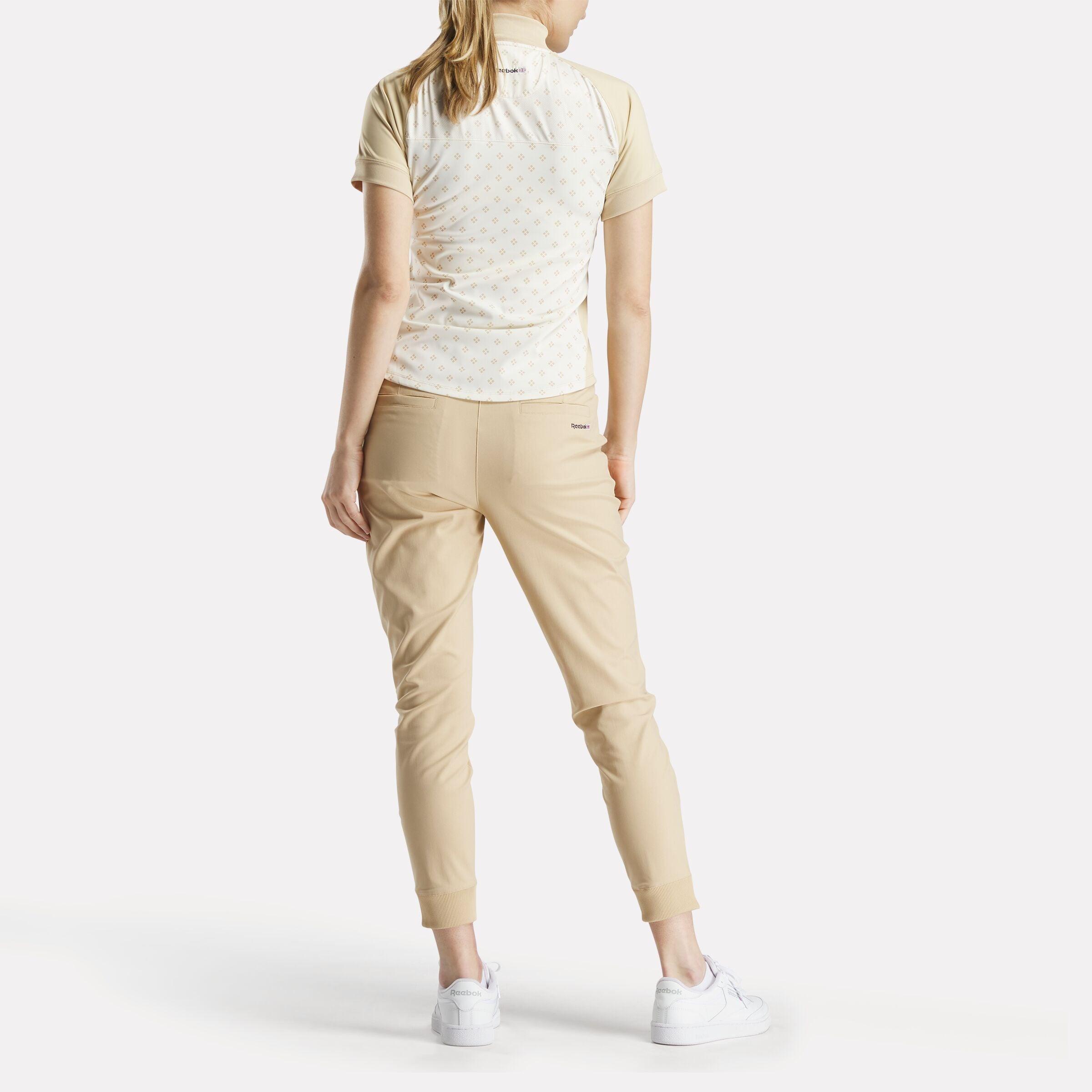 Women's Short Sleeve 1/4 Zip Mini Argyle Print Top Female Product Image